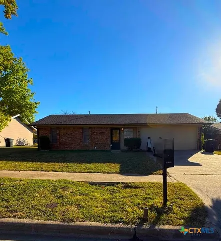 a view of a swimming pool with an ocean view