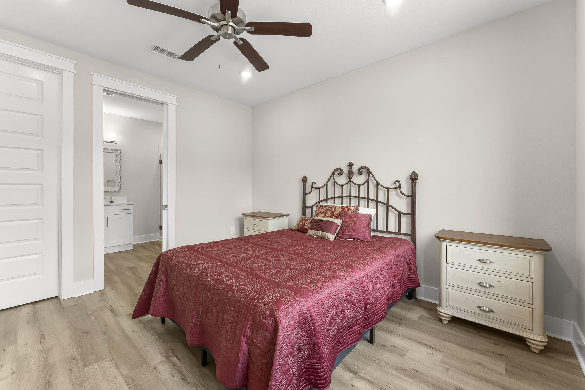 725 J D Miller Road, Unit 106 Santa Rosa Beach, FL 32459 - Photo 15 of 19 a bedroom with a bed and a dresser
