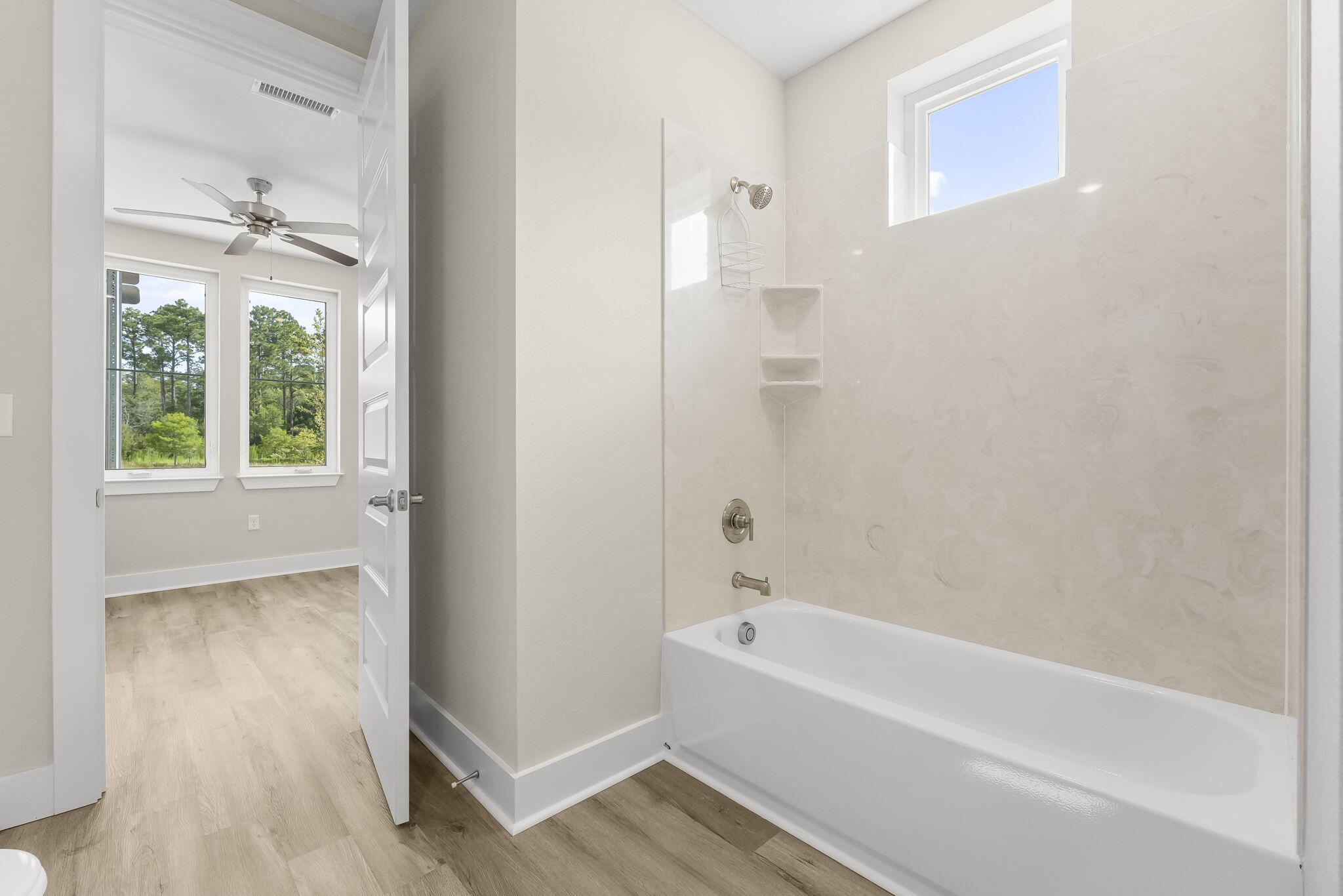 725 J D Miller Road, Unit 106 Santa Rosa Beach, FL 32459 - Photo 17 of 19 a bathroom with a bathtub and a shower