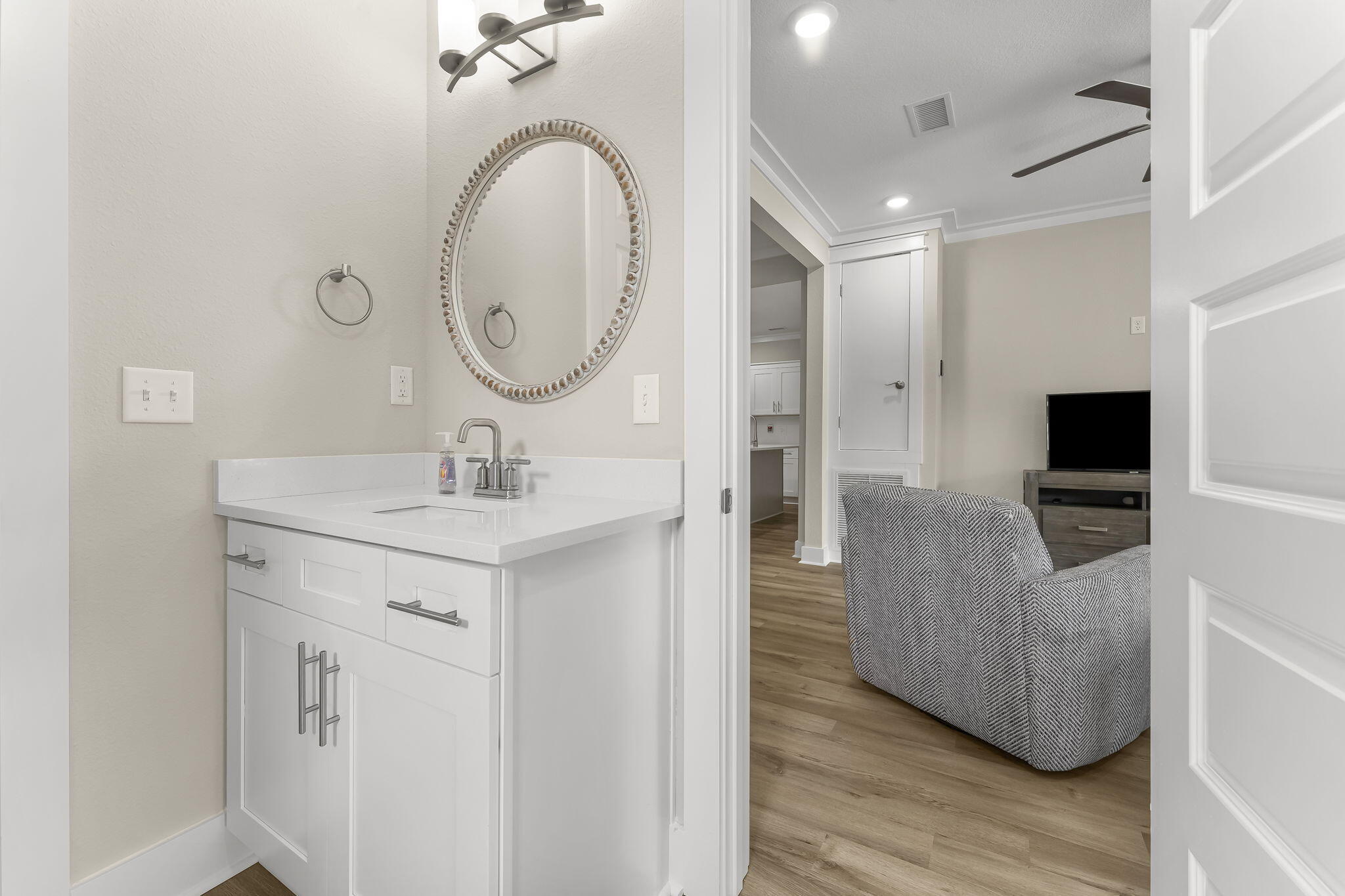 725 J D Miller Road, Unit 106 Santa Rosa Beach, FL 32459 - Photo 18 of 19 a en suite bathroom with a sink and a mirror