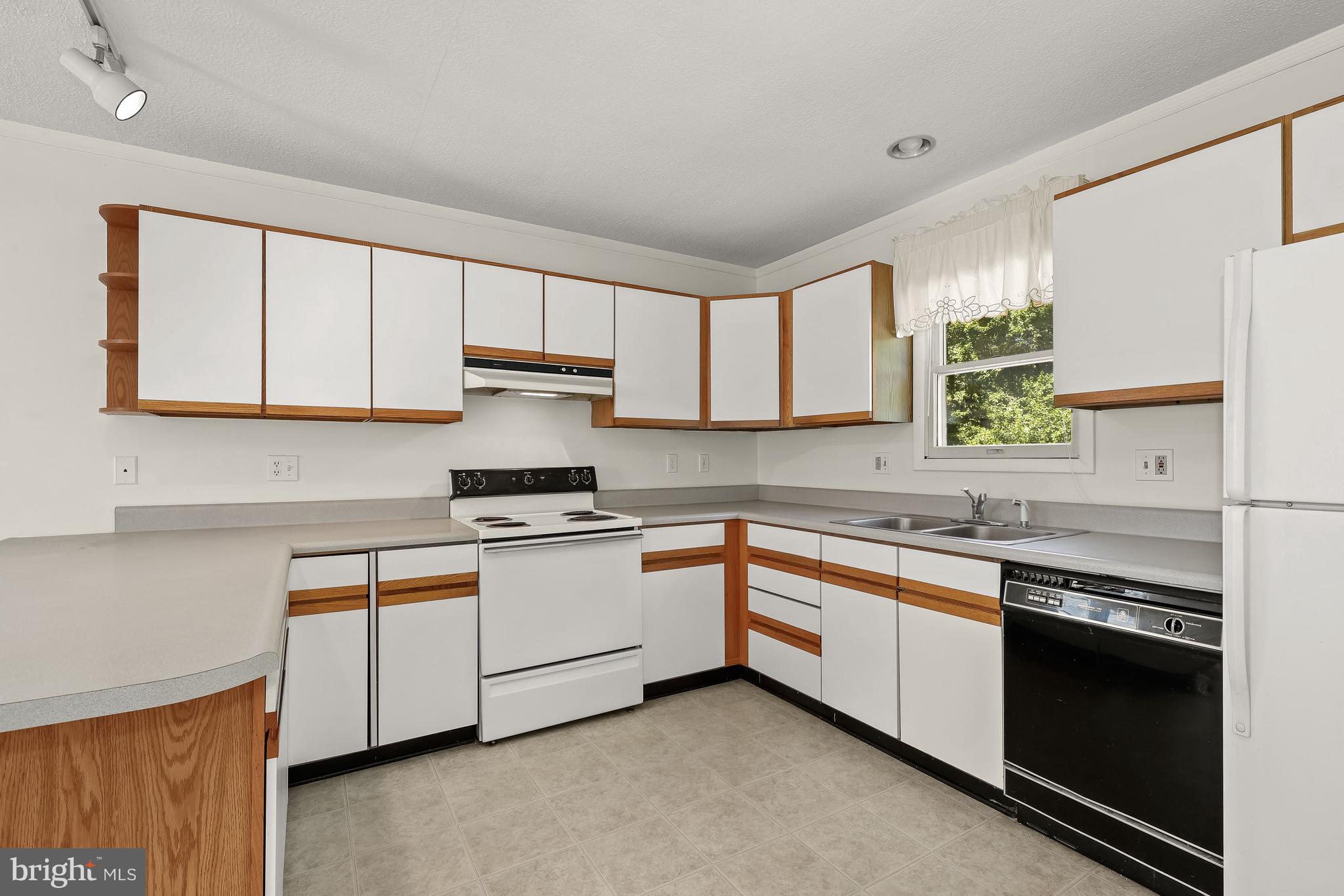 9299 All Saints Road Laurel, MD 20723 - Photo 36 of 51 Garage Loft Kitchen