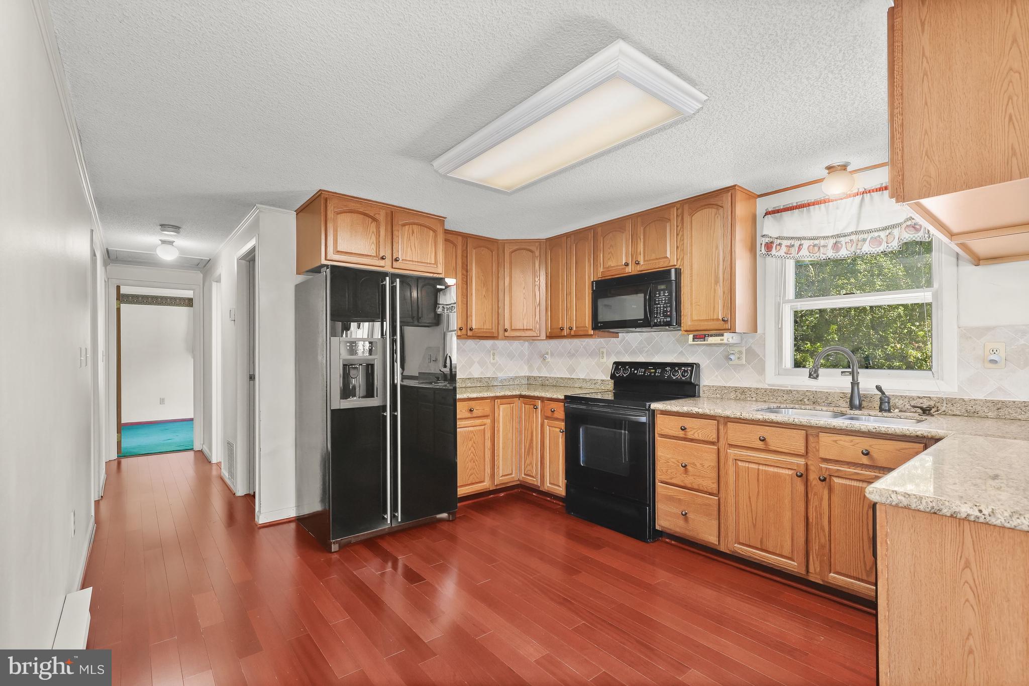 9299 All Saints Road Laurel, MD 20723 - Photo 8 of 51 Kitchen