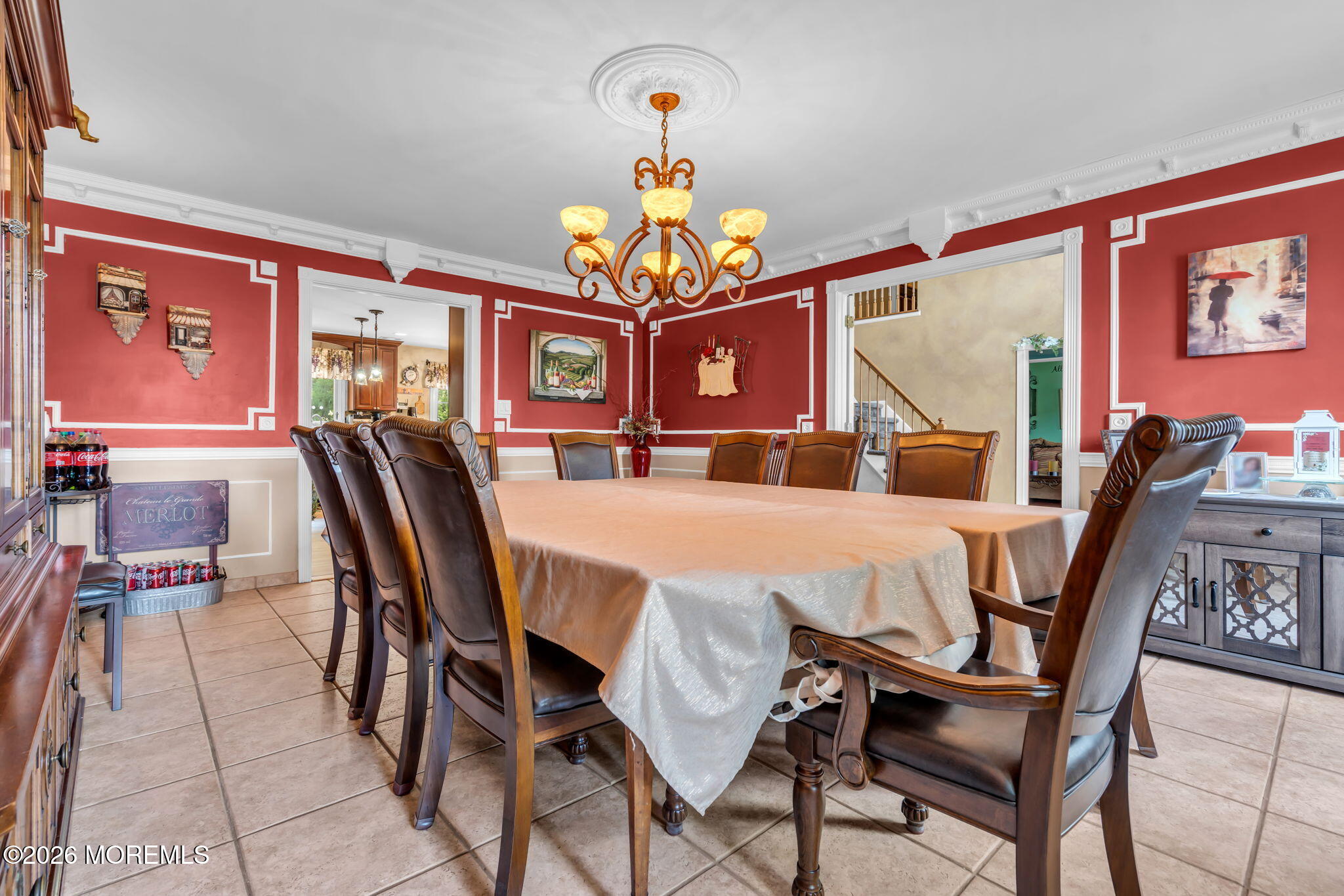 21 Ryan Road Marlboro, NJ 07746 - Photo 17 of 56 a view of a dining room with furniture and chandelier