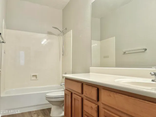 a bathroom with a sink a toilet and a bathtub