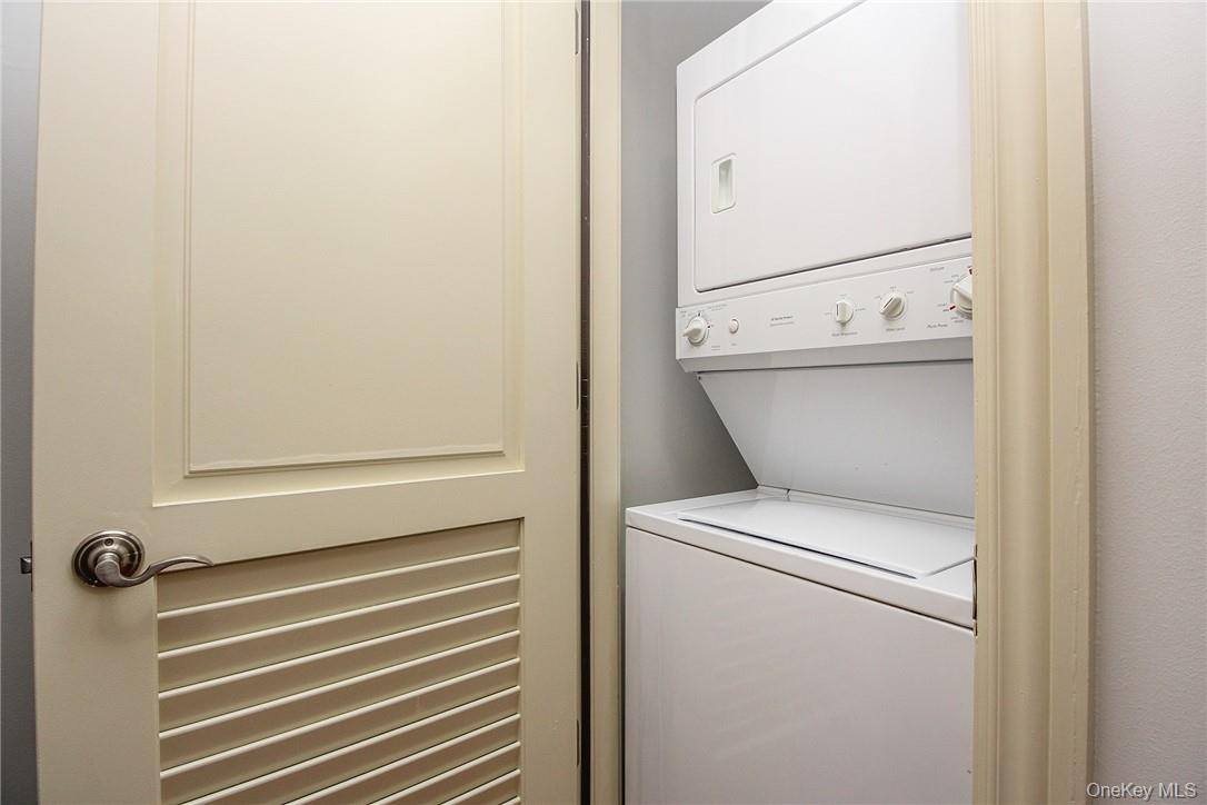 543 Main Street, Unit 211 New Rochelle, NY 10801 - Photo 18 of 22 a close up view of a washer and dryer