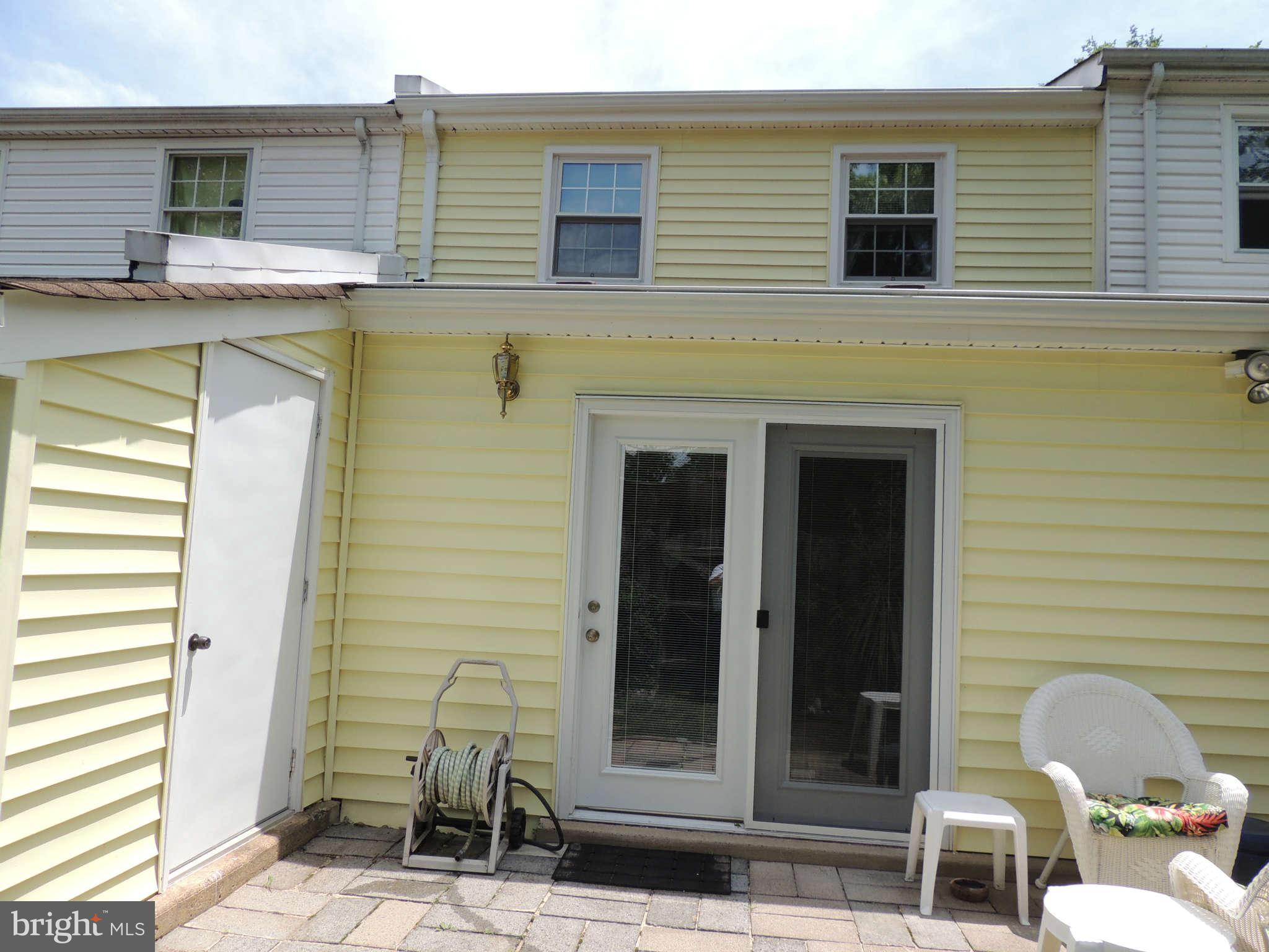 3795 Port Hope Point Triangle, VA 22172 - Photo 25 of 26 a view of house with chair and tables