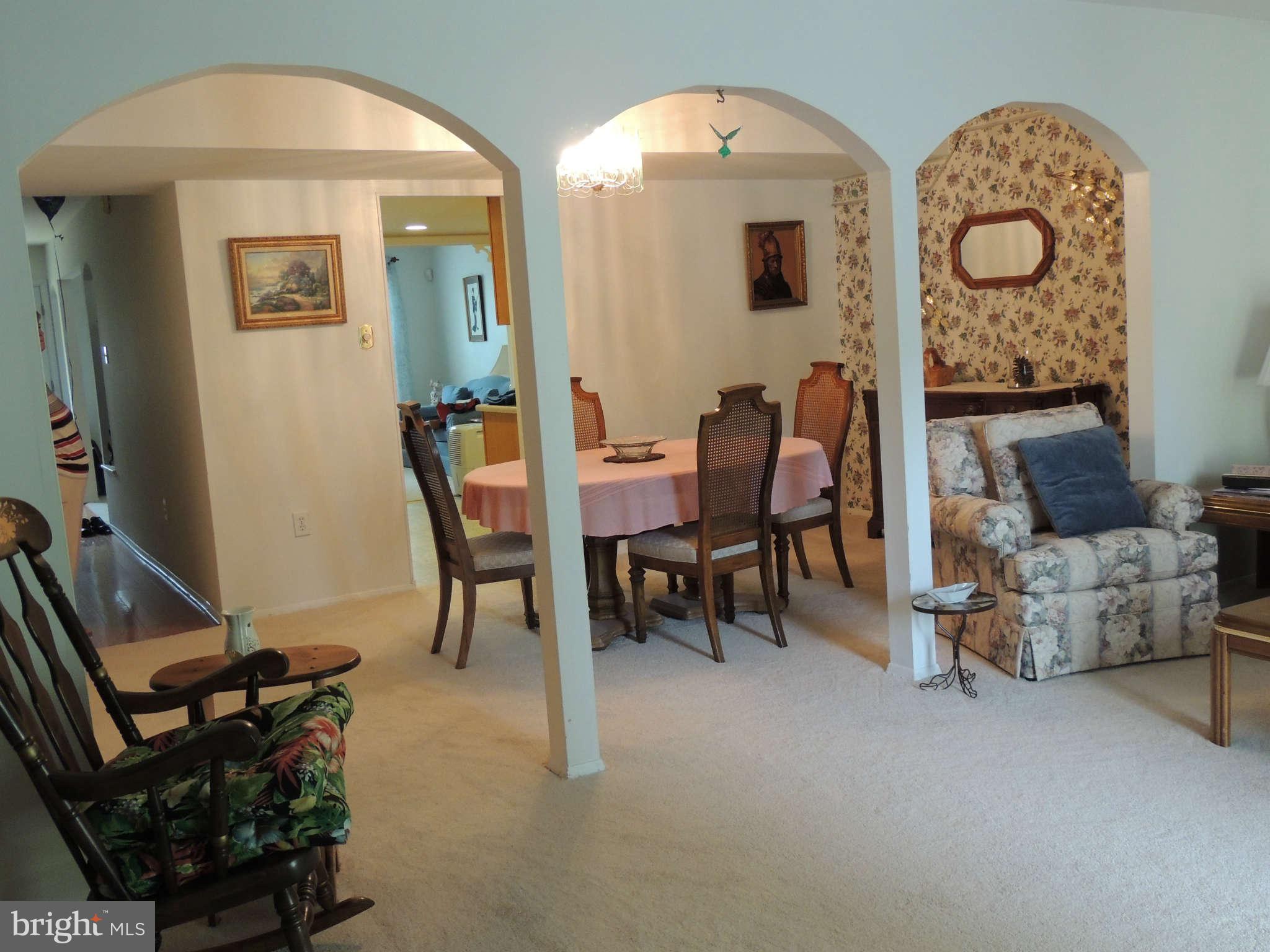 3795 Port Hope Point Triangle, VA 22172 - Photo 7 of 26 a view of a livingroom with furniture and windows