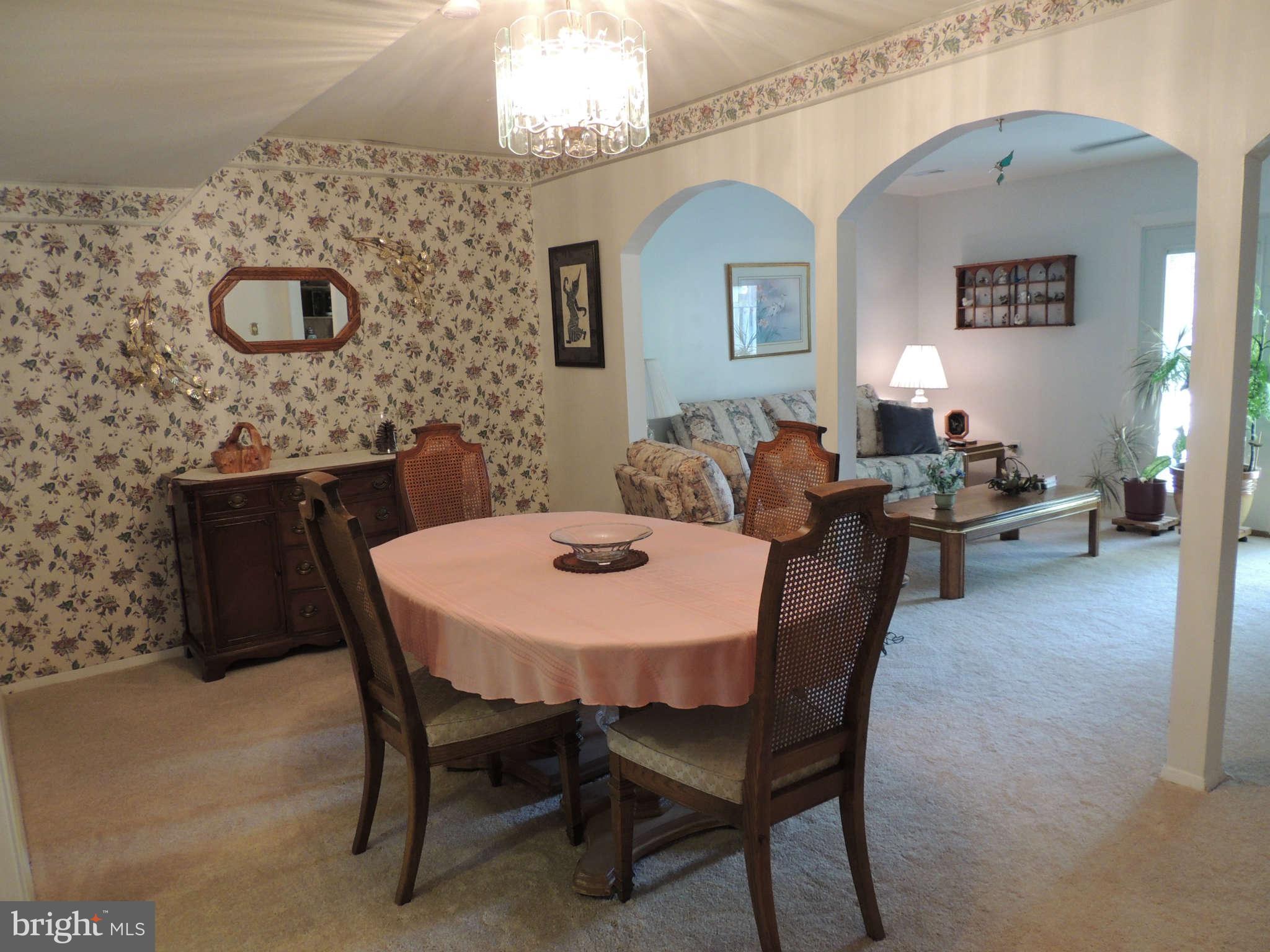 3795 Port Hope Point Triangle, VA 22172 - Photo 8 of 26 a view of a dining room with furniture