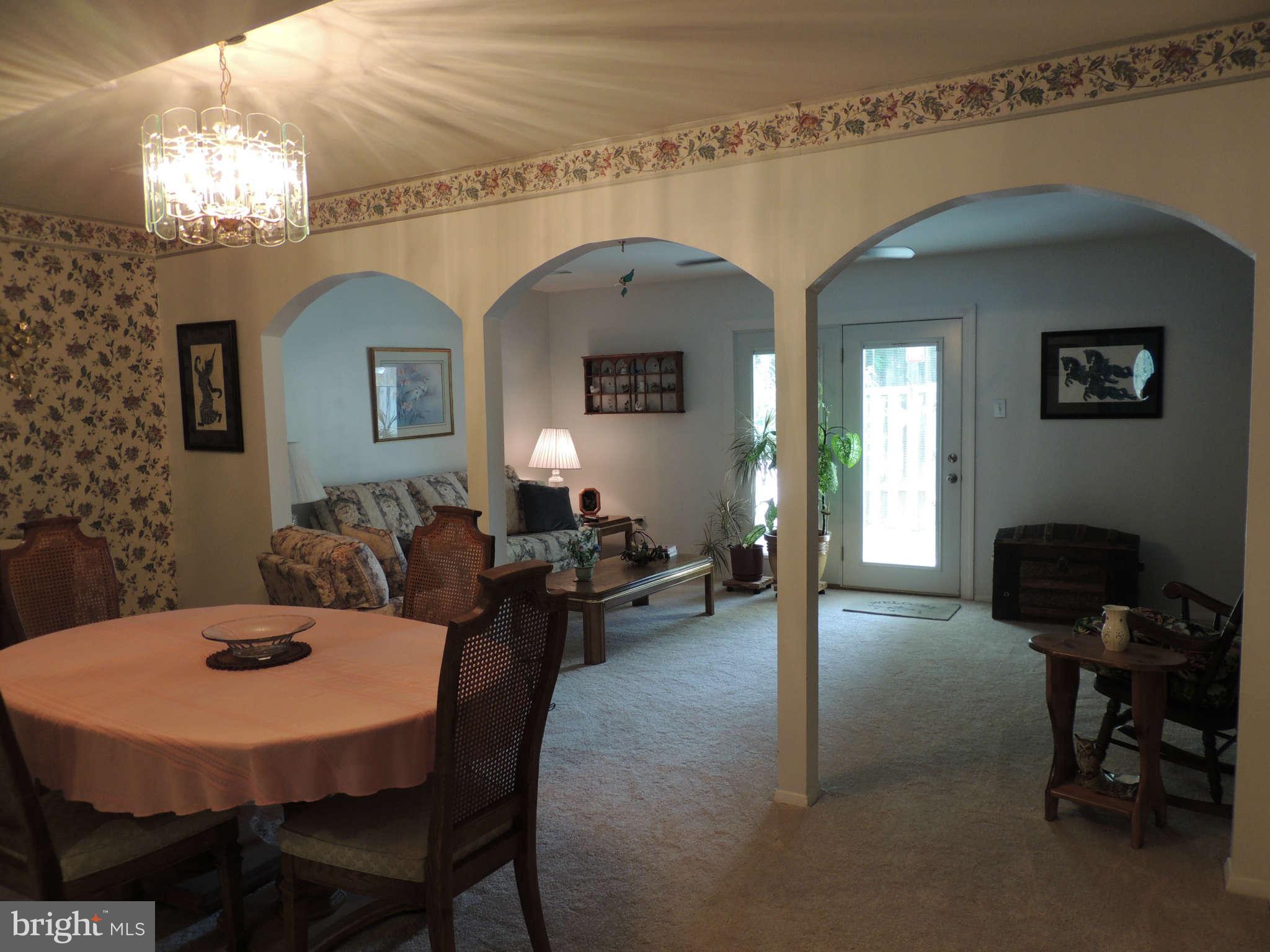 3795 Port Hope Point Triangle, VA 22172 - Photo 9 of 26 a view of a dining room with furniture