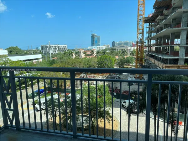 a view of outdoor space and backyard