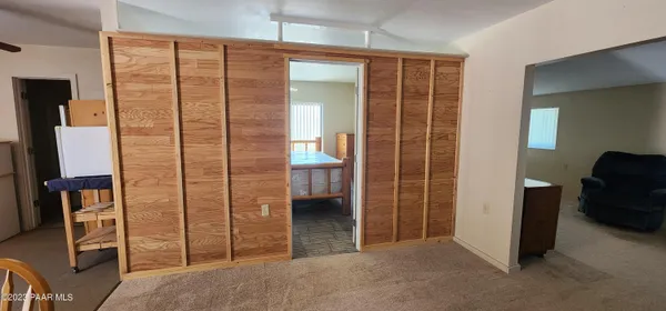 wooden floor and chair in a room