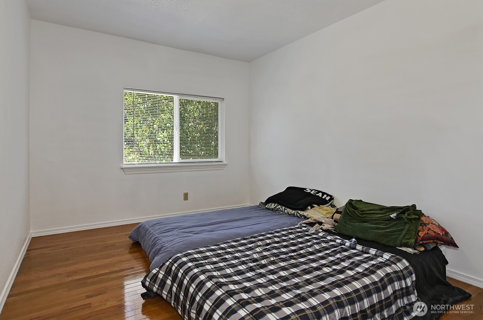7660 South 126th Street Seattle, WA 98178 - Photo 21 of 33 a bedroom with a bed and a window
