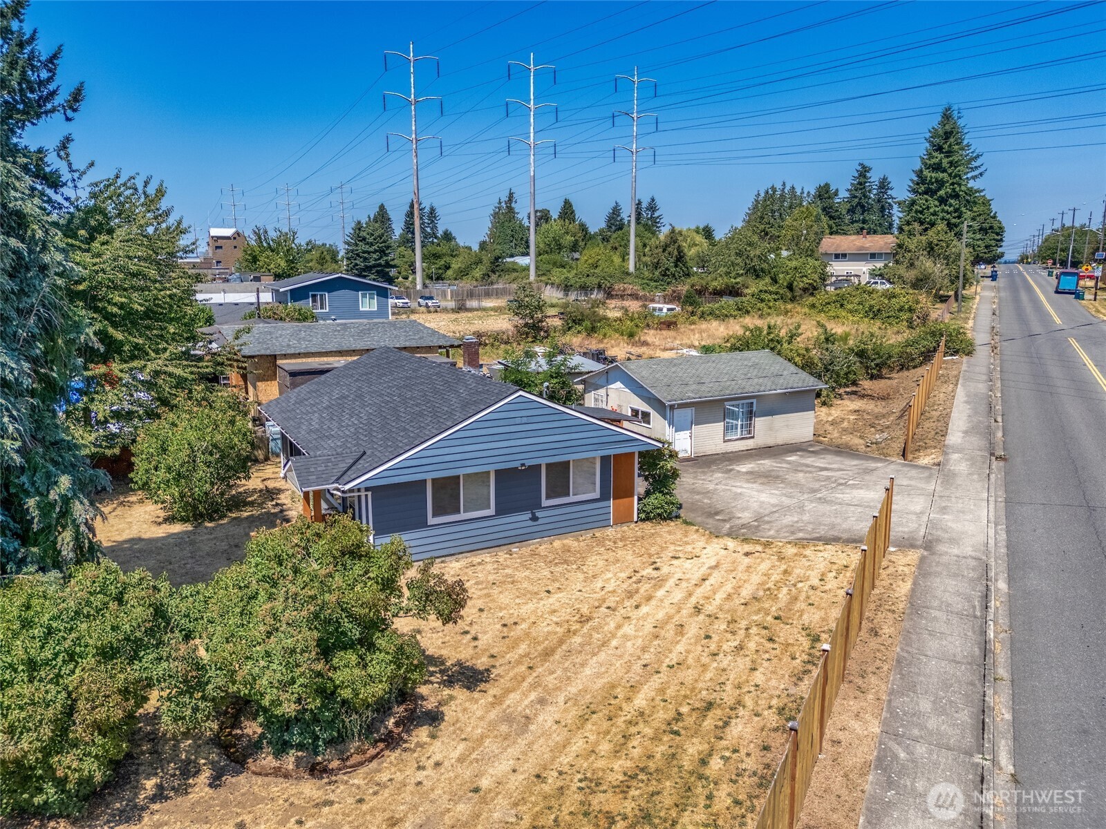 7660 South 126th Street Seattle, WA 98178 - Photo 28 of 33 a view of a house with a yard