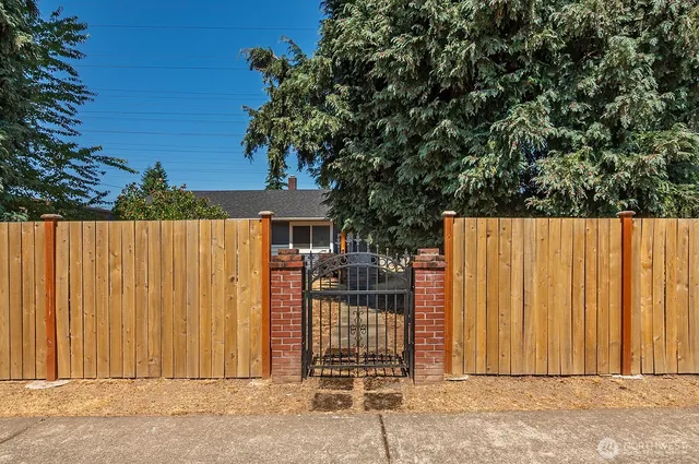 a view of a wooden fence