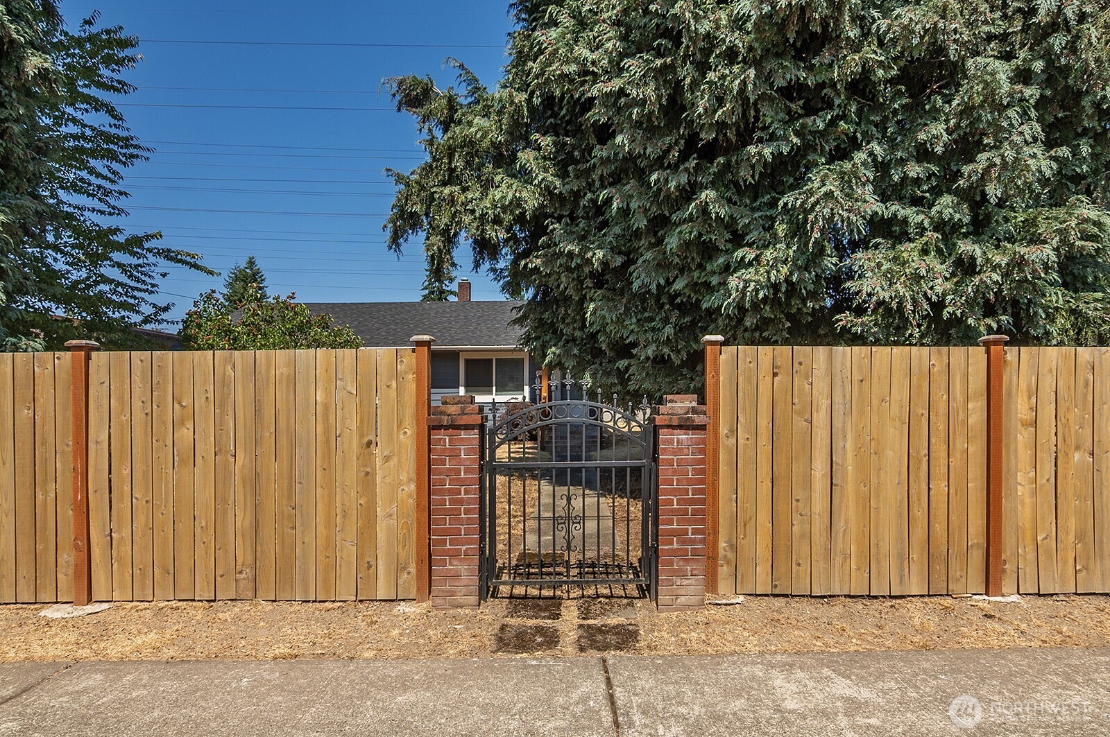 7660 South 126th Street Seattle, WA 98178 - Photo 7 of 33 a view of a wooden fence