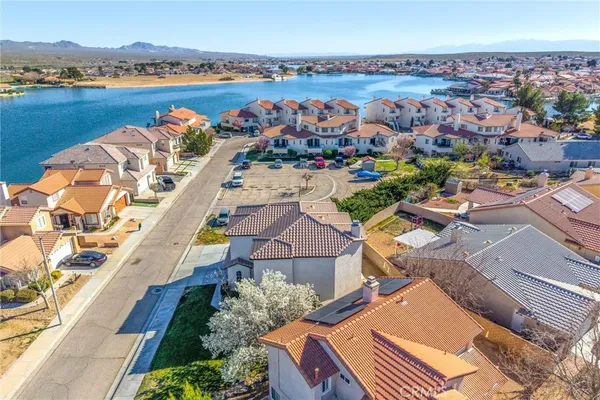 an aerial view of a house with a ocean view