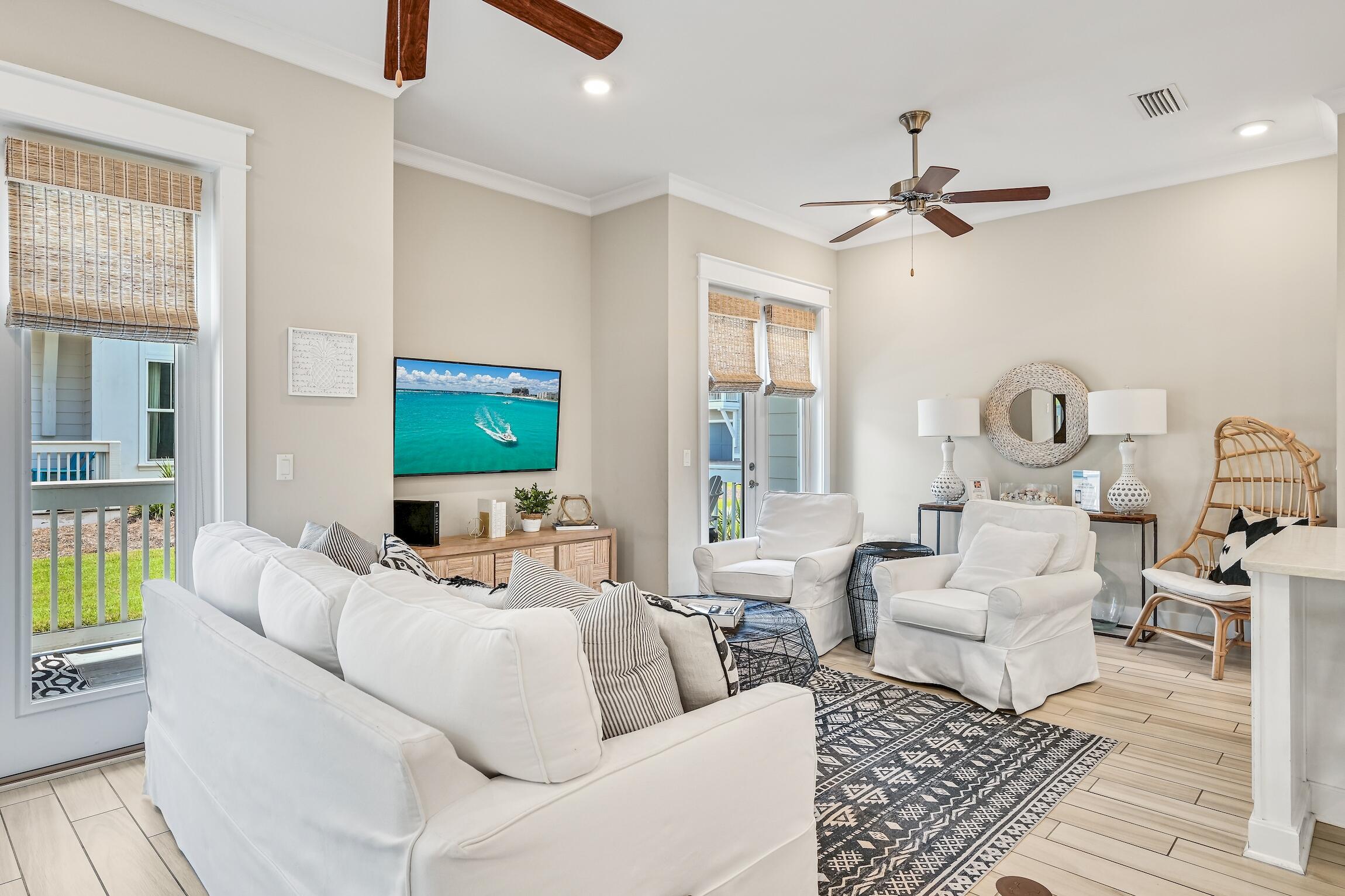 35 East Milestone Dr Inlet Beach, Unit A Inlet Beach, FL 32461 - Photo 14 of 45 a living room with furniture and a flat screen tv