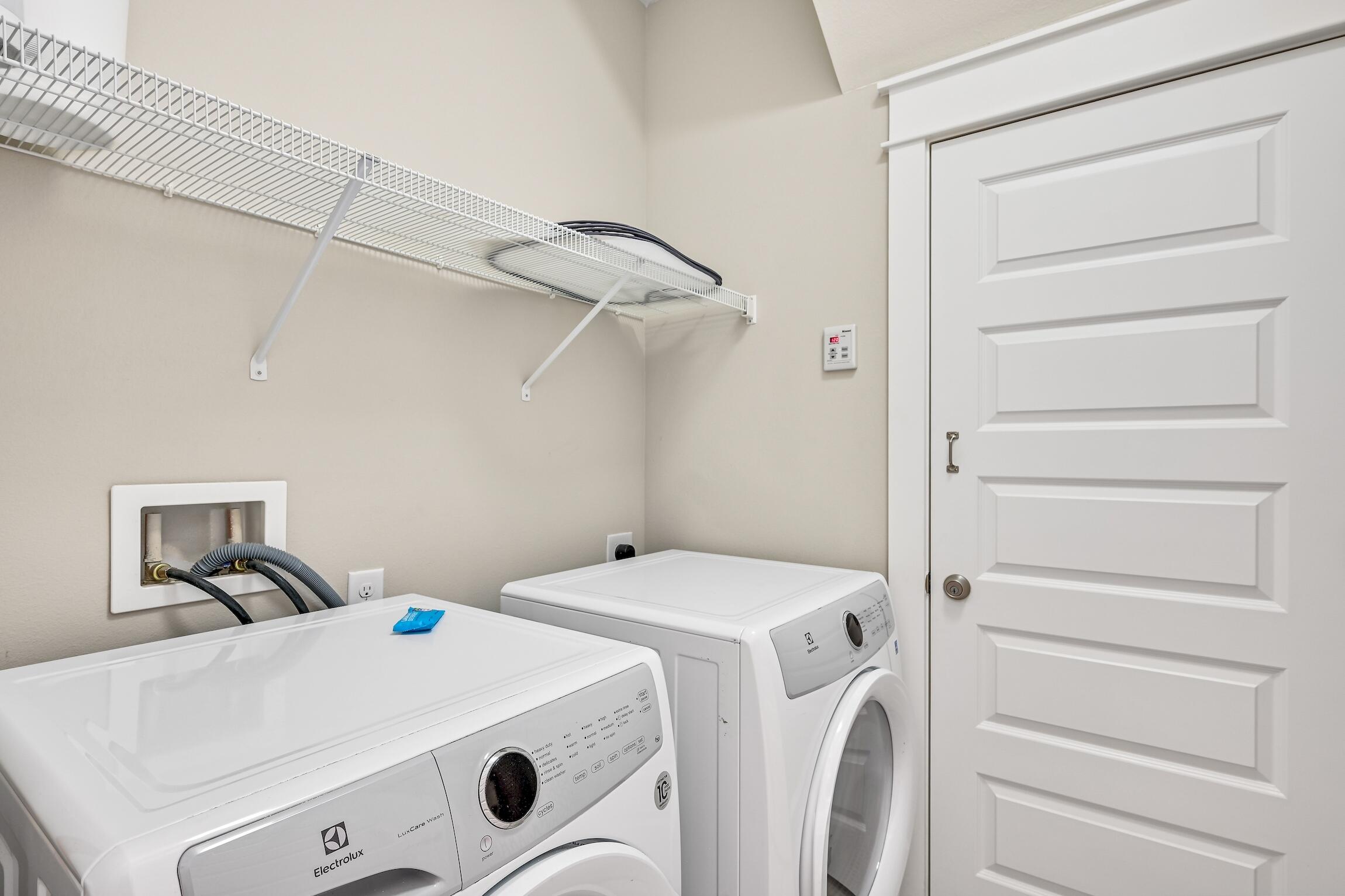35 East Milestone Dr Inlet Beach, Unit A Inlet Beach, FL 32461 - Photo 17 of 45 a utility room with dryer and washer