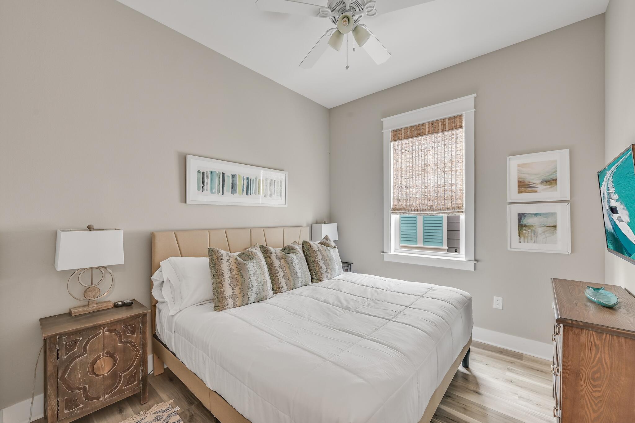 35 East Milestone Dr Inlet Beach, Unit A Inlet Beach, FL 32461 - Photo 22 of 45 a bedroom with a bed and a window