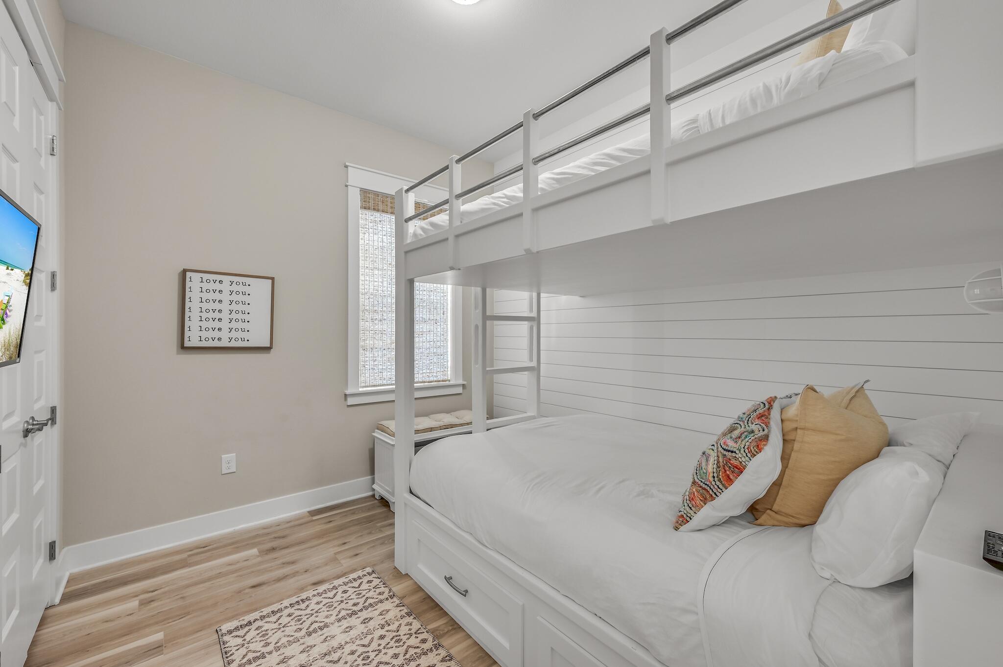 35 East Milestone Dr Inlet Beach, Unit A Inlet Beach, FL 32461 - Photo 25 of 45 a bedroom with a bed and a window