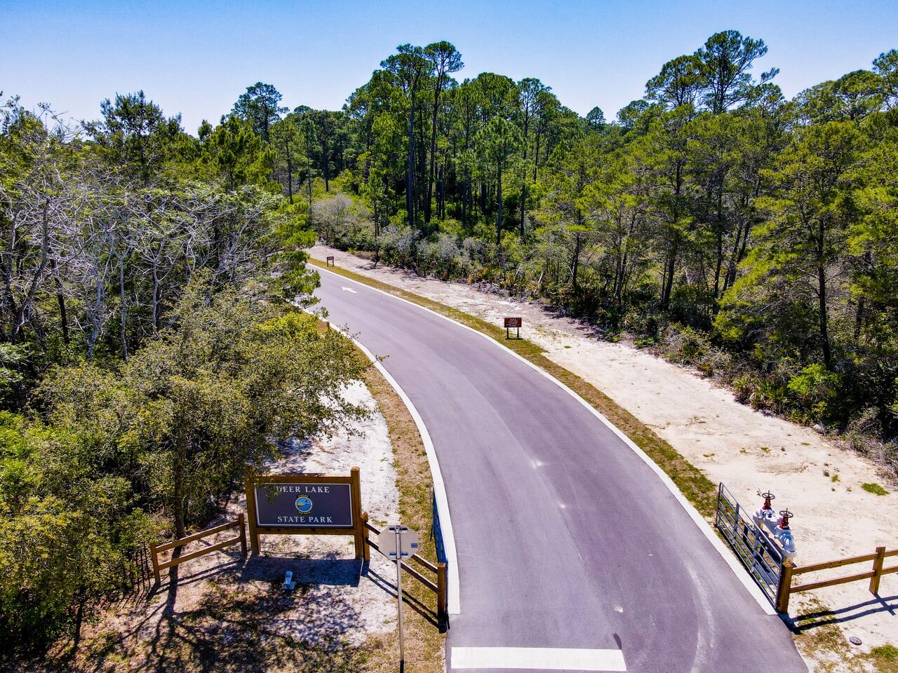 35 East Milestone Dr Inlet Beach, Unit A Inlet Beach, FL 32461 - Photo 39 of 45 a view of a pathway with a yard
