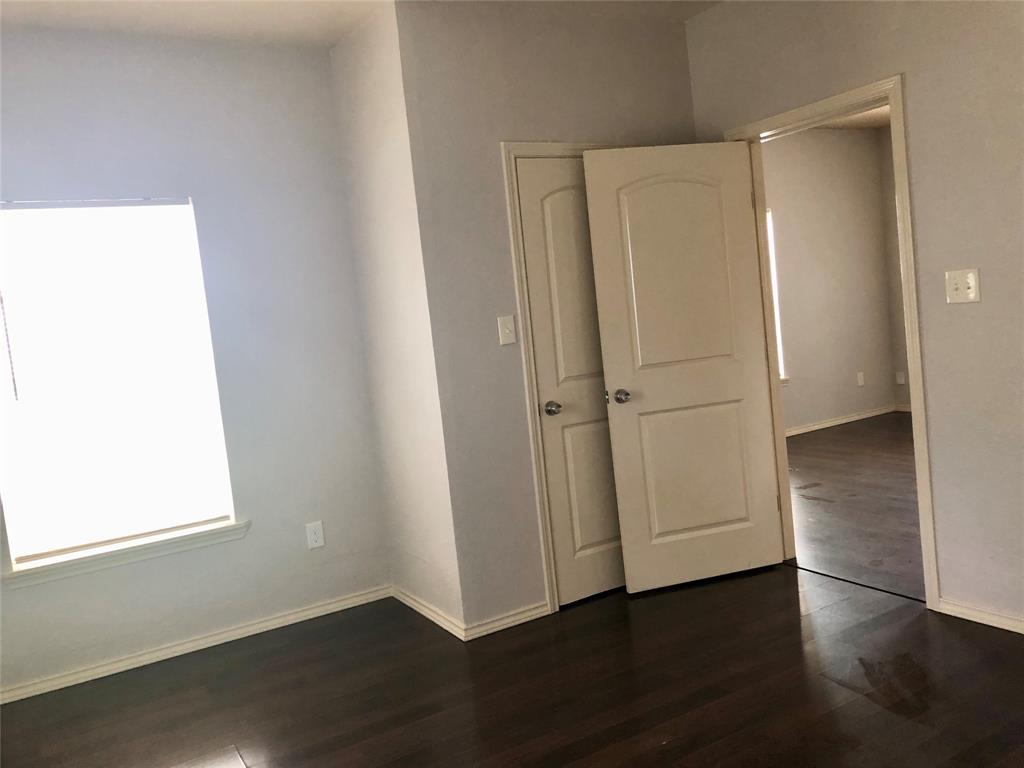 905 Isbell Road Fort Worth, TX 76114 - Photo 5 of 29 Spacious bedroom 1 , faces the front of the property