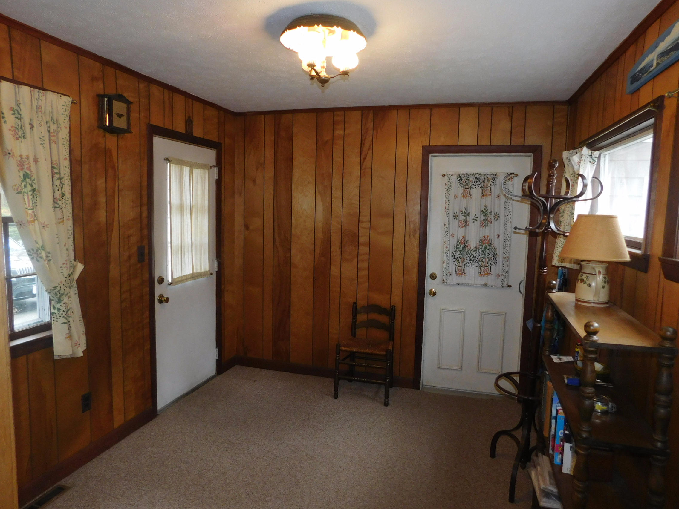 202 Woodside Road West Barnstable, MA 02668 - Photo 14 of 21 wooden floor and windows in a room