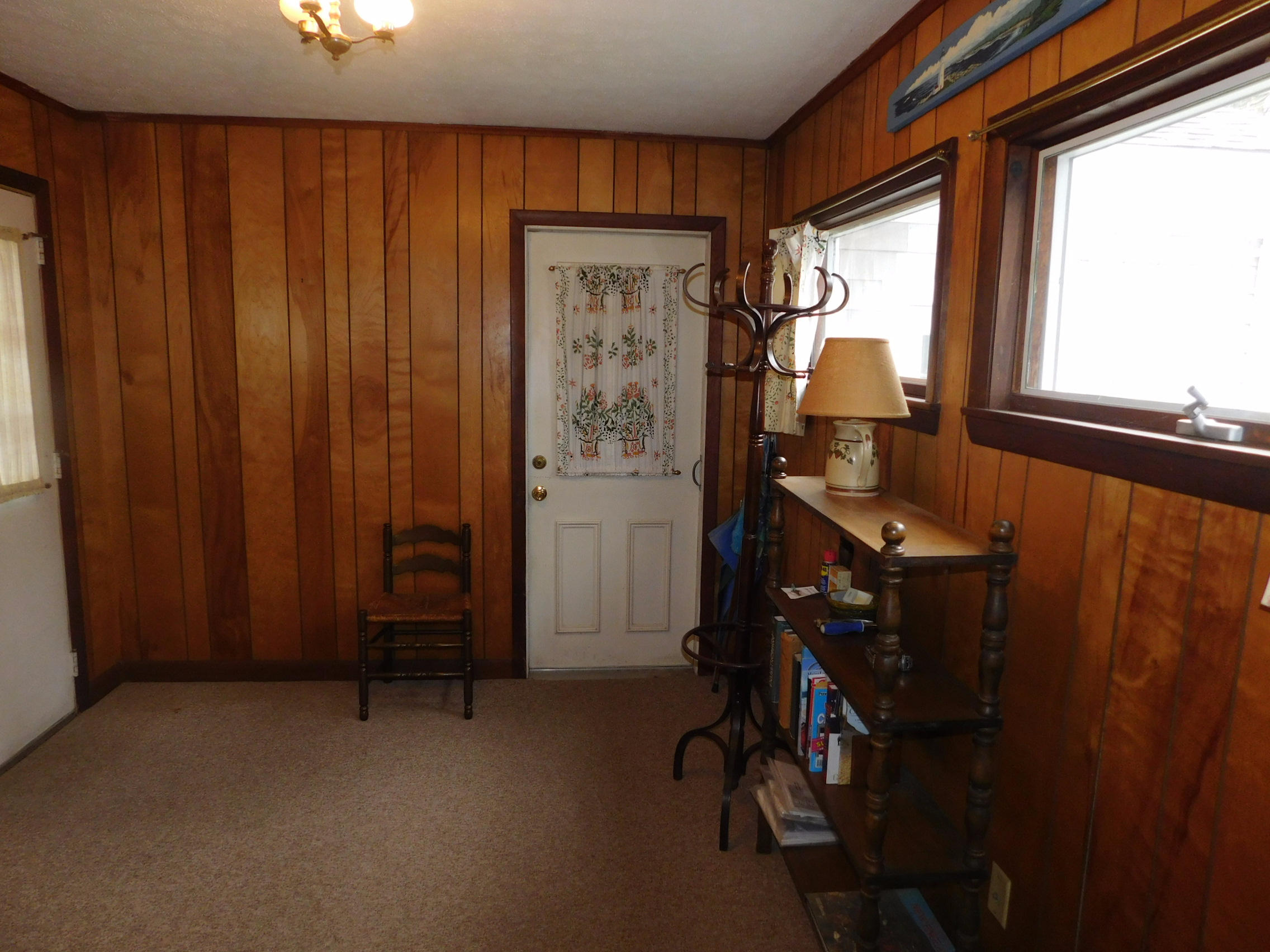 202 Woodside Road West Barnstable, MA 02668 - Photo 15 of 21 a view of hallway with furniture and a window