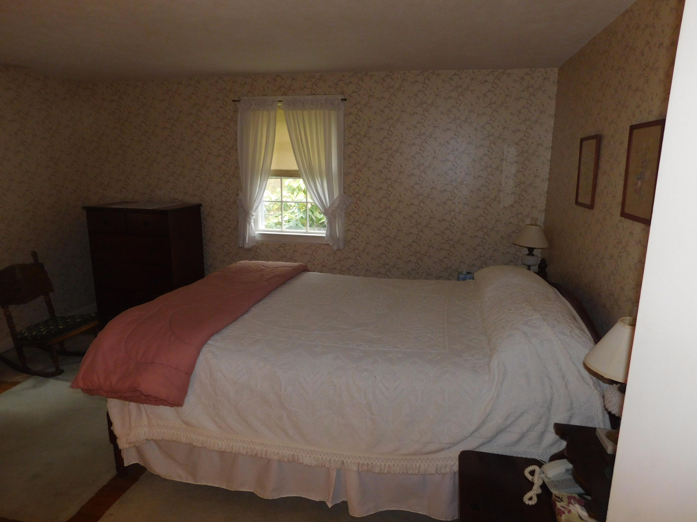 202 Woodside Road West Barnstable, MA 02668 - Photo 19 of 21 a bed sitting in a bedroom next to a window