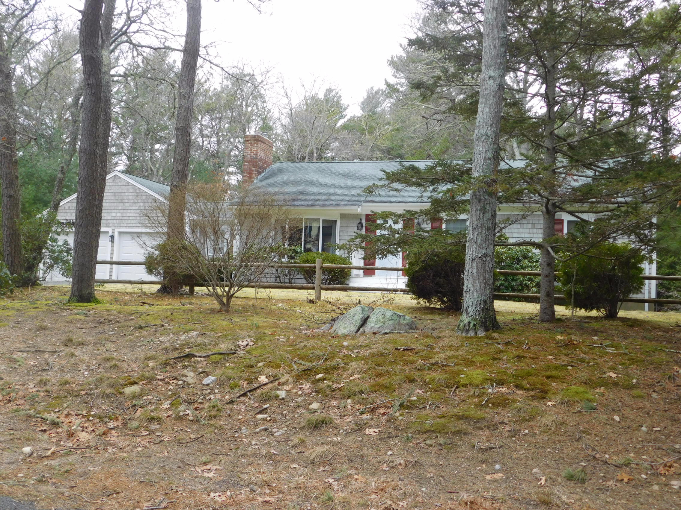 202 Woodside Road West Barnstable, MA 02668 - Photo 3 of 21 a view of a town with palm trees