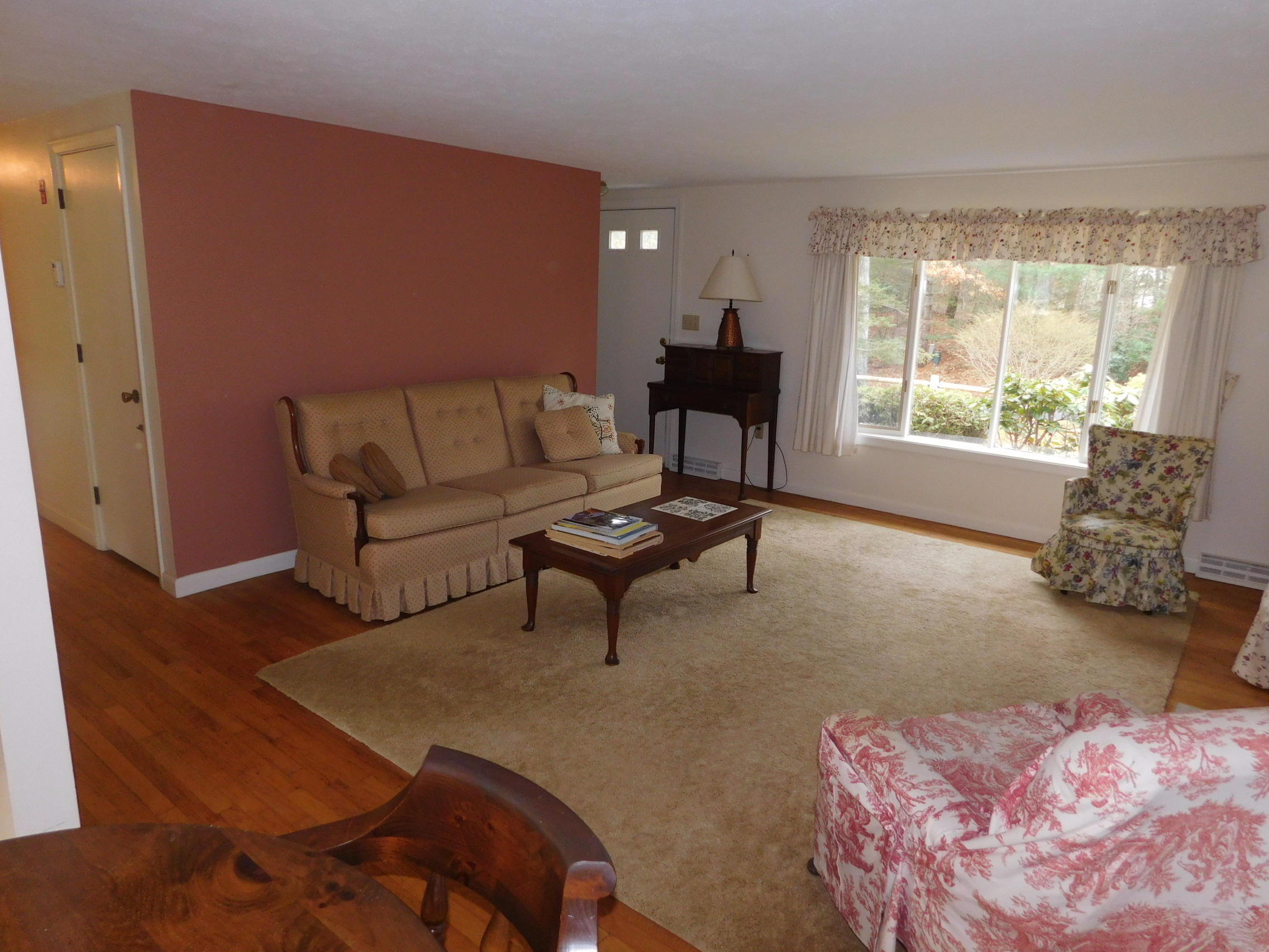 202 Woodside Road West Barnstable, MA 02668 - Photo 9 of 21 a living room with furniture and a large window