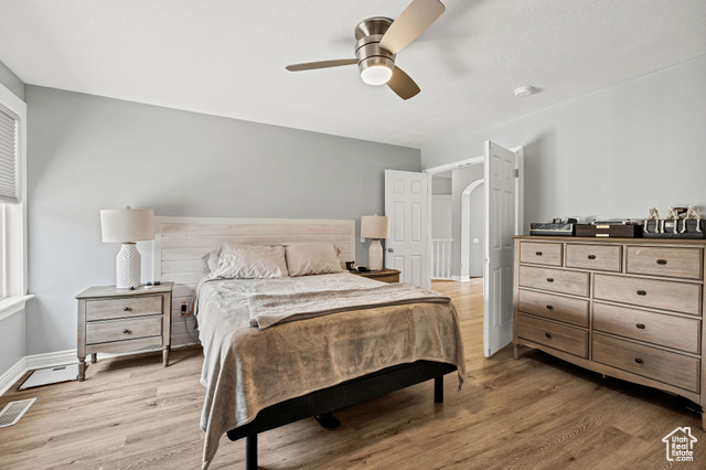 2280 South 450 West Perry, UT 84302 - Photo 16 of 38 Bedroom featuring light wood-style flooring and a ceiling fan