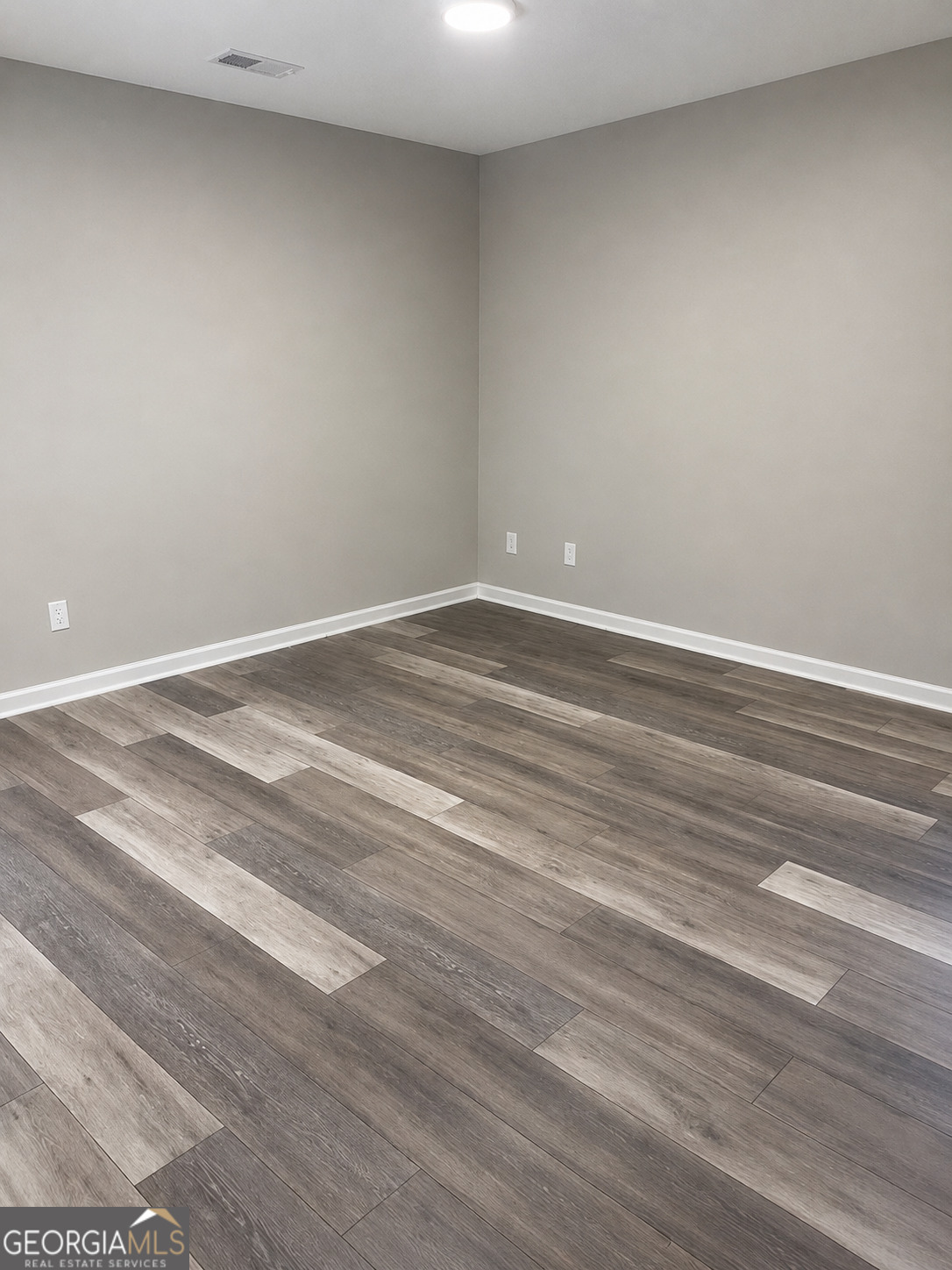 105 Dailey Mill Road McDonough, GA 30253 - Photo 12 of 19 a view of a room with wooden floor