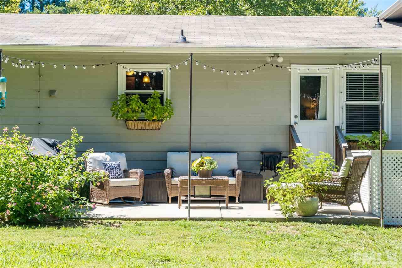 1005 Plateau Lane Raleigh, NC 27615 - Photo 3 of 29 a garden view with sitting space