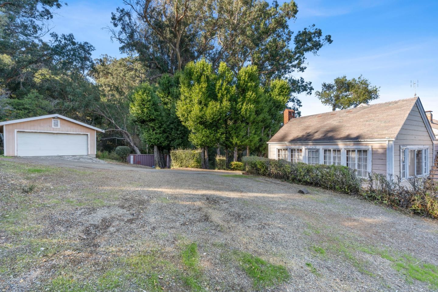 18860 Overlook Road Los Gatos, CA 95030 - Photo 18 of 32 a view of a house with a yard and large tree