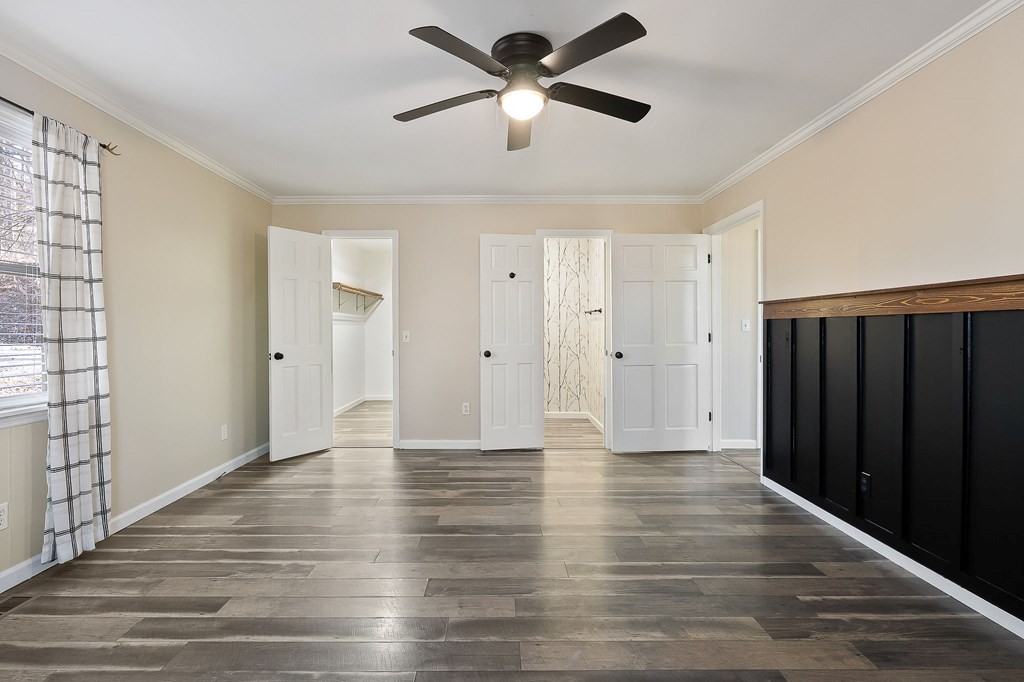 7927 Rocky Point Road Cookeville, TN 38506 - Photo 12 of 26 a view of an empty room with wooden floor