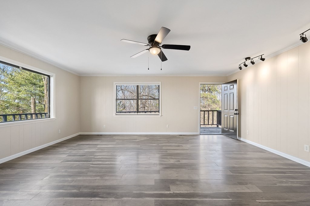 7927 Rocky Point Road Cookeville, TN 38506 - Photo 6 of 26 wooden floor in an empty room with a window