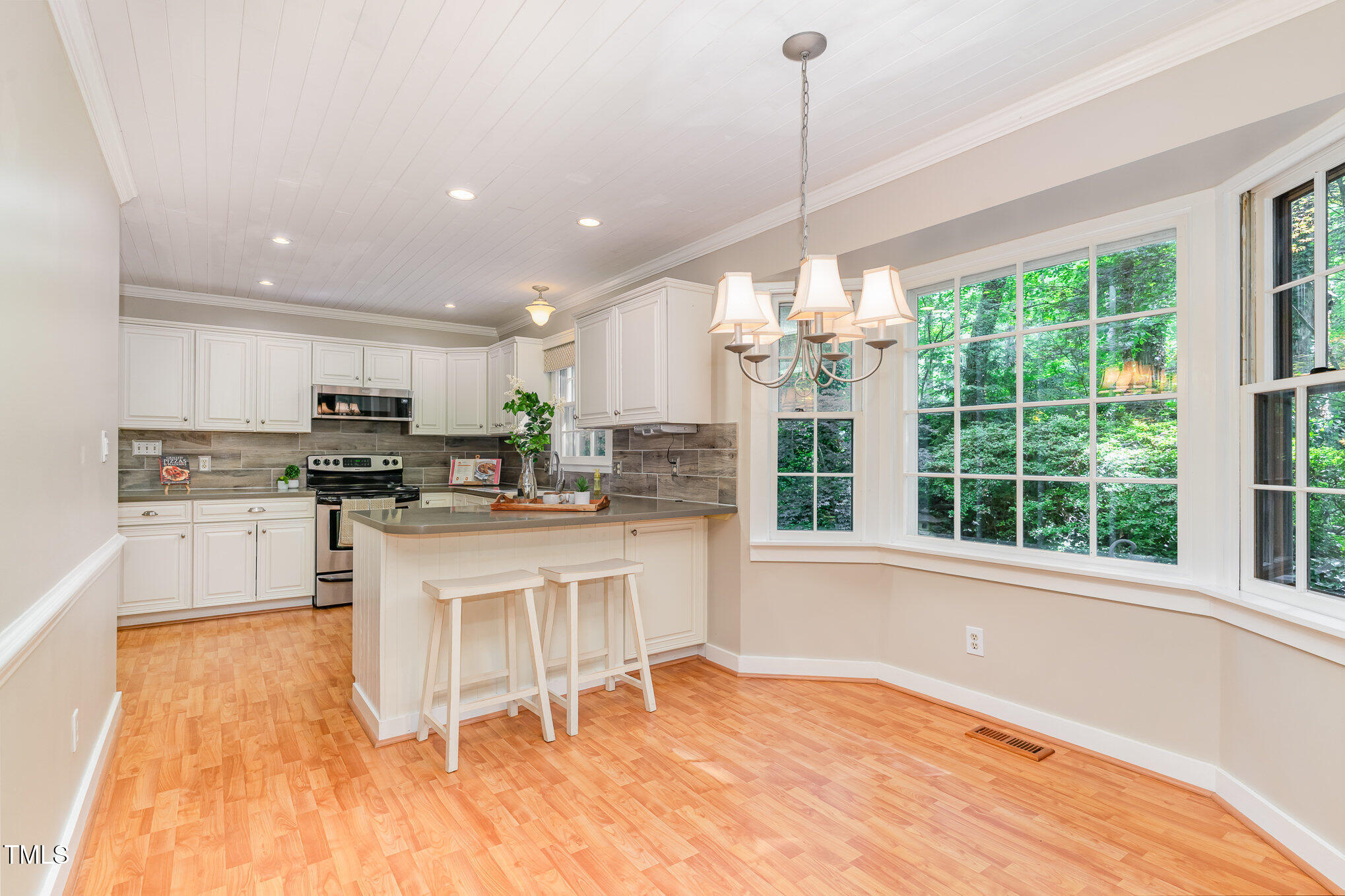 12709 Timberlane Court Raleigh, NC 27613 - Photo 14 of 44 Informal Breakfast nook for cozy and busy mornings with memorable conversations !