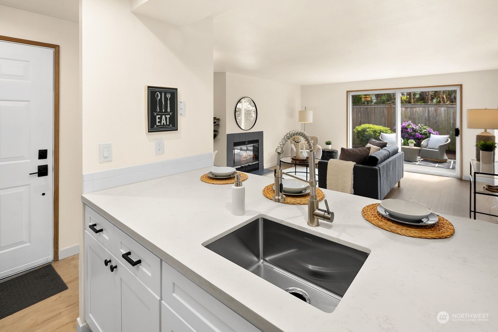 5421 Fauntleroy Way Southwest, Unit A Seattle, WA 98136 - Photo 4 of 18 a living room with furniture and a window