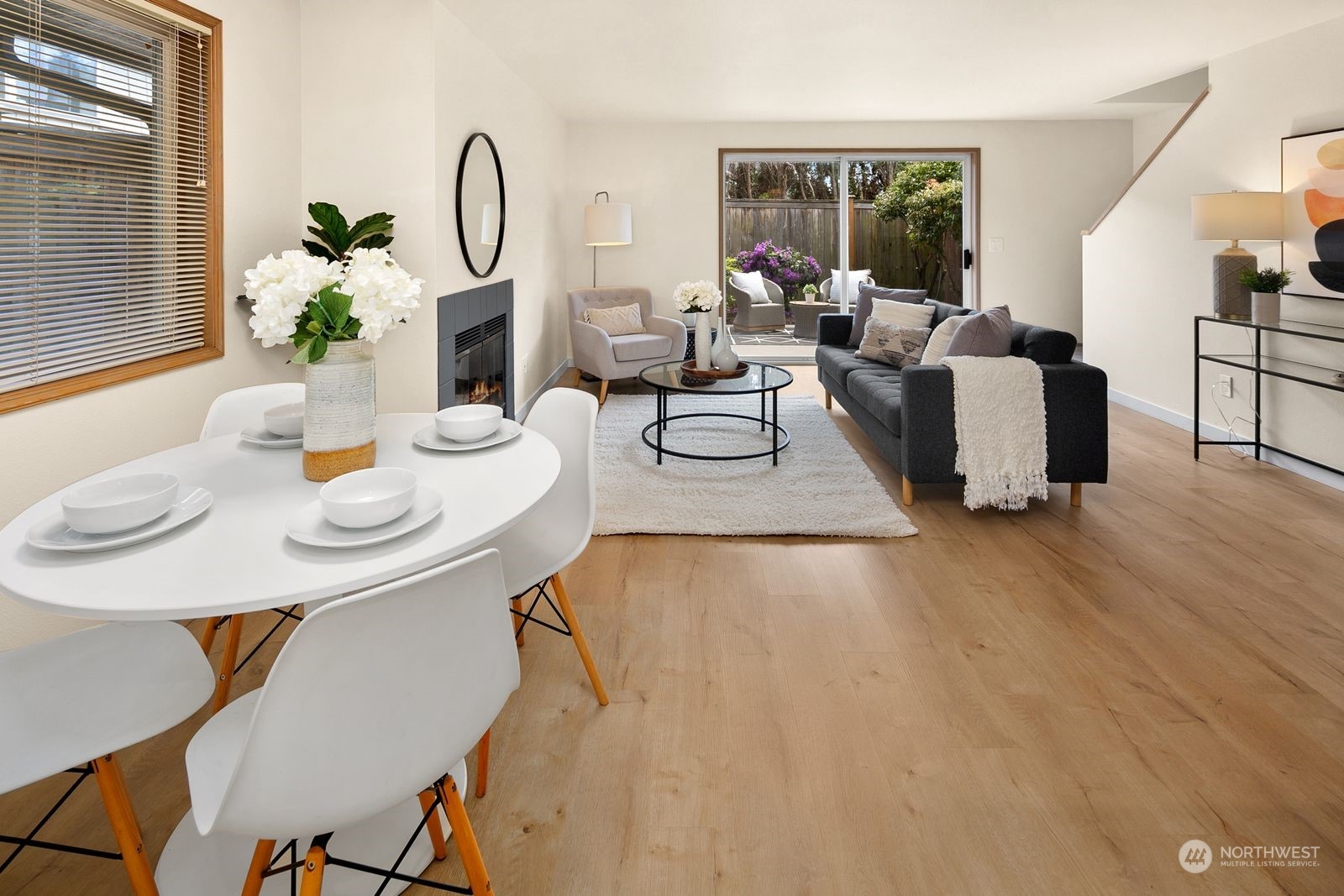 5421 Fauntleroy Way Southwest, Unit A Seattle, WA 98136 - Photo 9 of 18 a living room with furniture and a potted plant