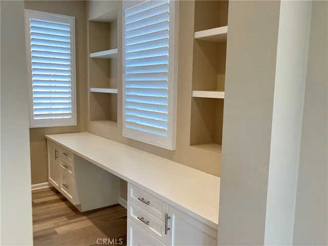 a kitchen with a sink and an oven