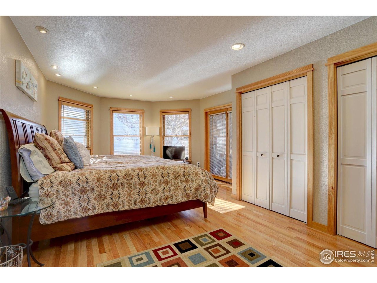 815 16th Street Boulder, CO 80302 - Photo 16 of 47 a bedroom with a bed and window