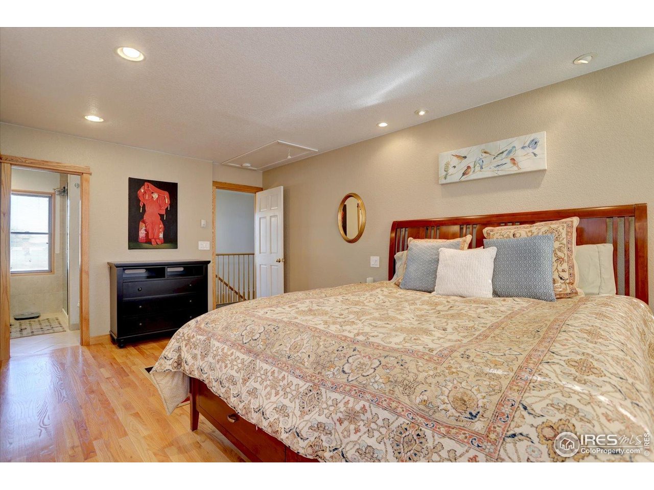 815 16th Street Boulder, CO 80302 - Photo 17 of 47 a bedroom with a bed and a flat screen tv
