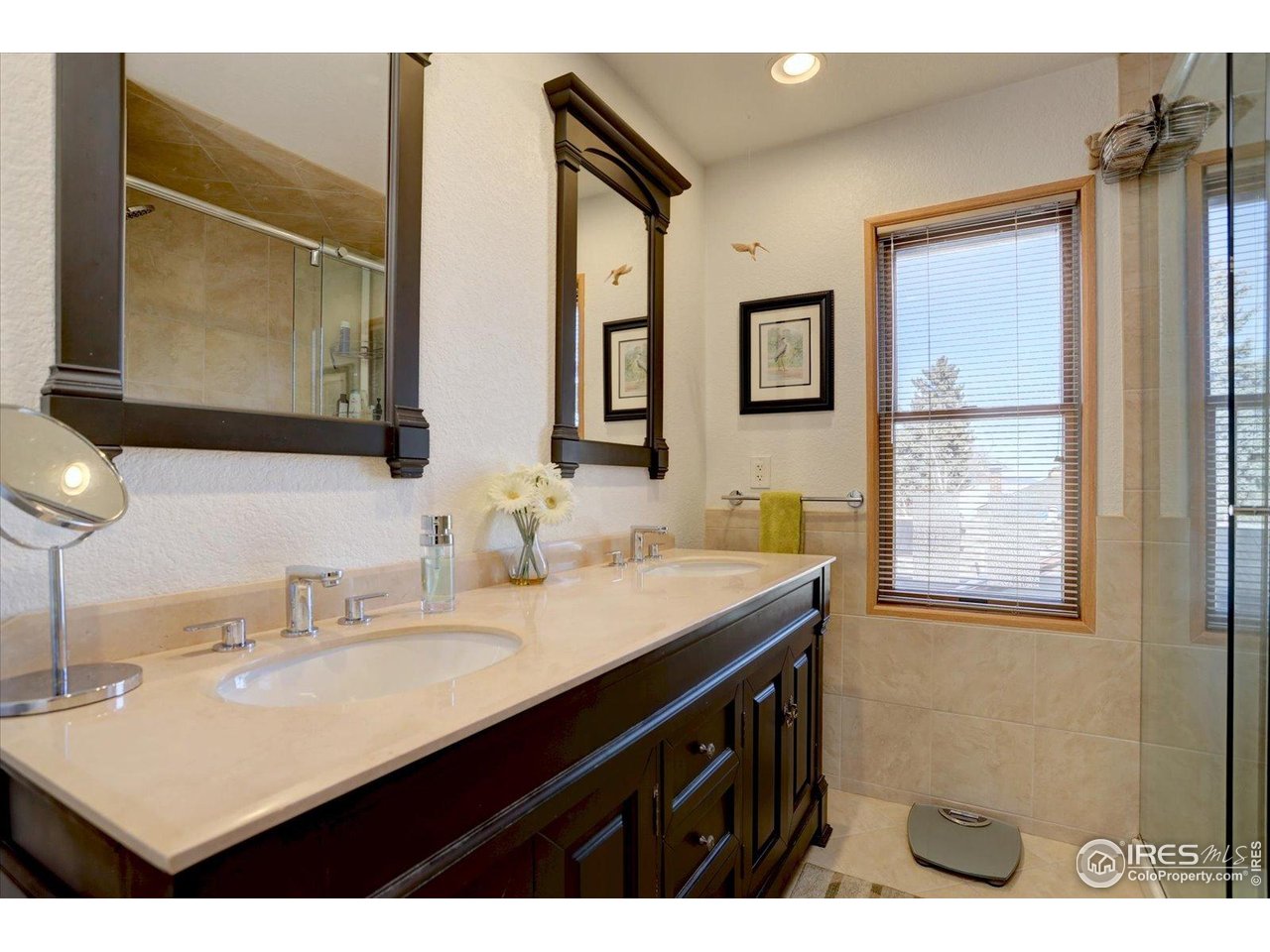 815 16th Street Boulder, CO 80302 - Photo 19 of 47 a bathroom with a sink vanity and a mirror