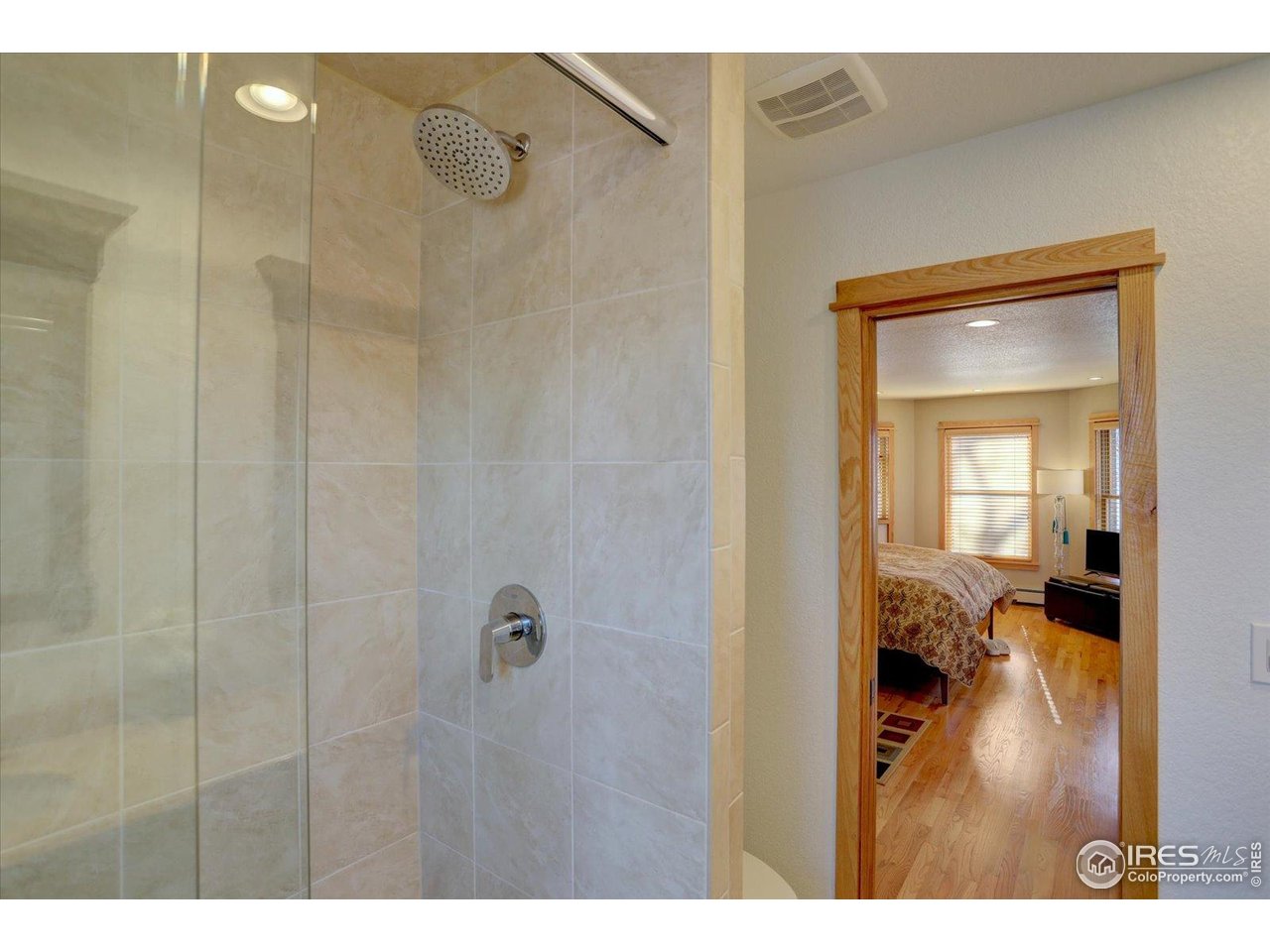 815 16th Street Boulder, CO 80302 - Photo 20 of 47 a bathroom with a glass shower door