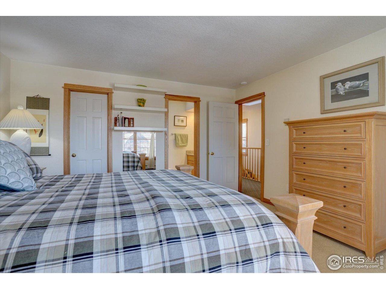 815 16th Street Boulder, CO 80302 - Photo 25 of 47 a bedroom with a bed and dresser