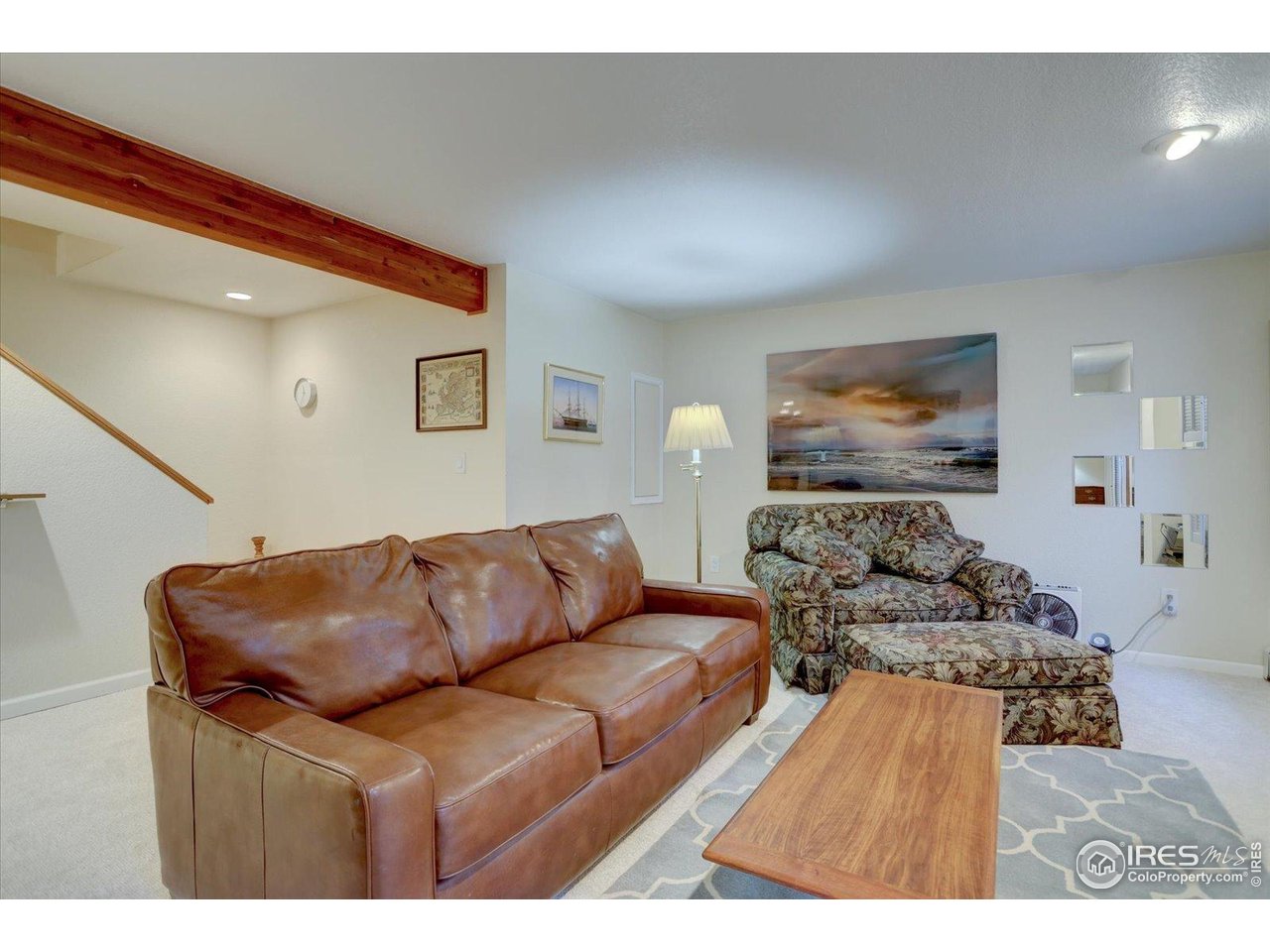 815 16th Street Boulder, CO 80302 - Photo 27 of 47 a living room with furniture and a flat screen tv