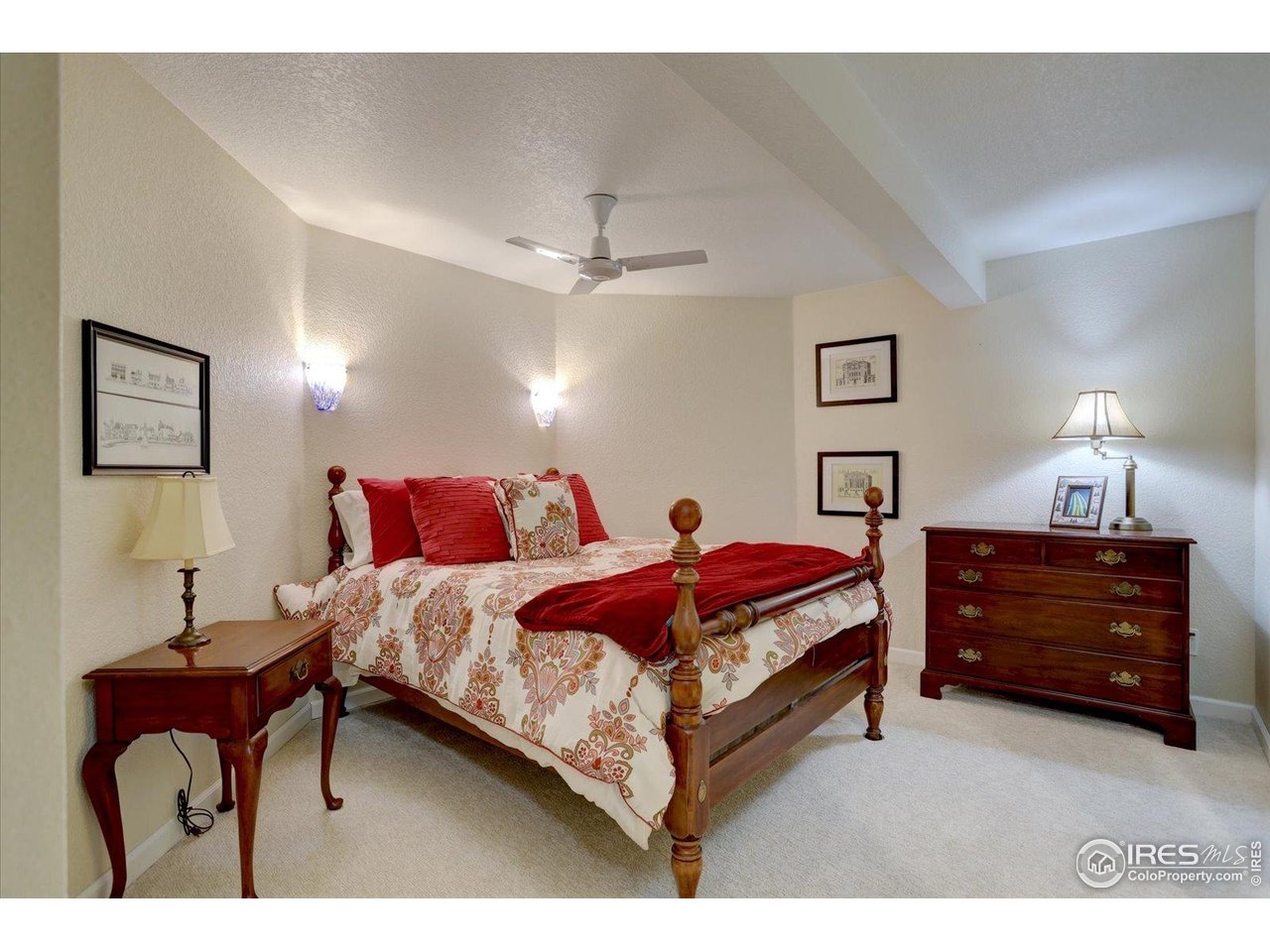 815 16th Street Boulder, CO 80302 - Photo 30 of 47 a bedroom with a bed and lamp