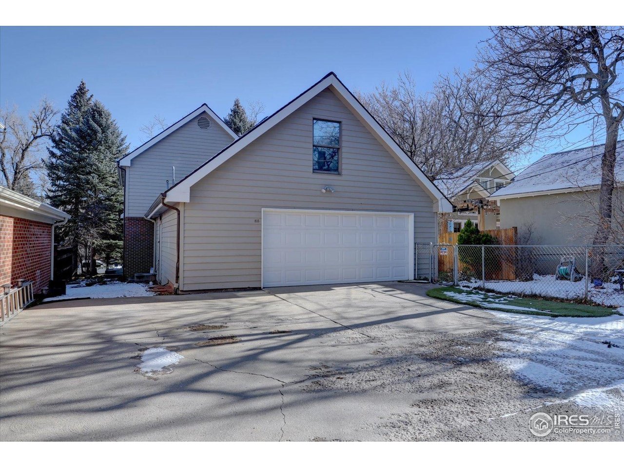 815 16th Street Boulder, CO 80302 - Photo 43 of 47 a view of an house with backyard and bushes