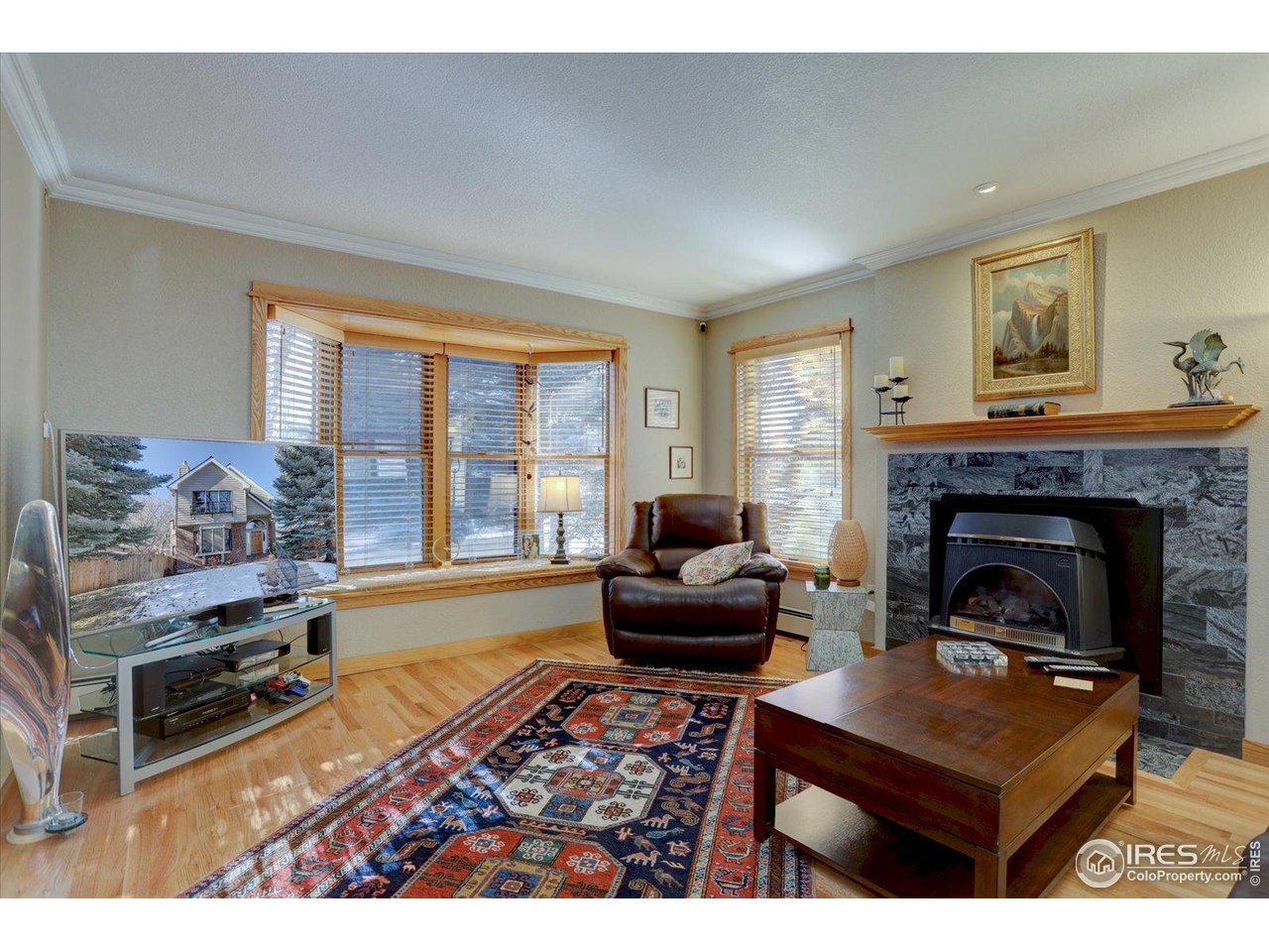 815 16th Street Boulder, CO 80302 - Photo 5 of 47 a living room with furniture and a fireplace